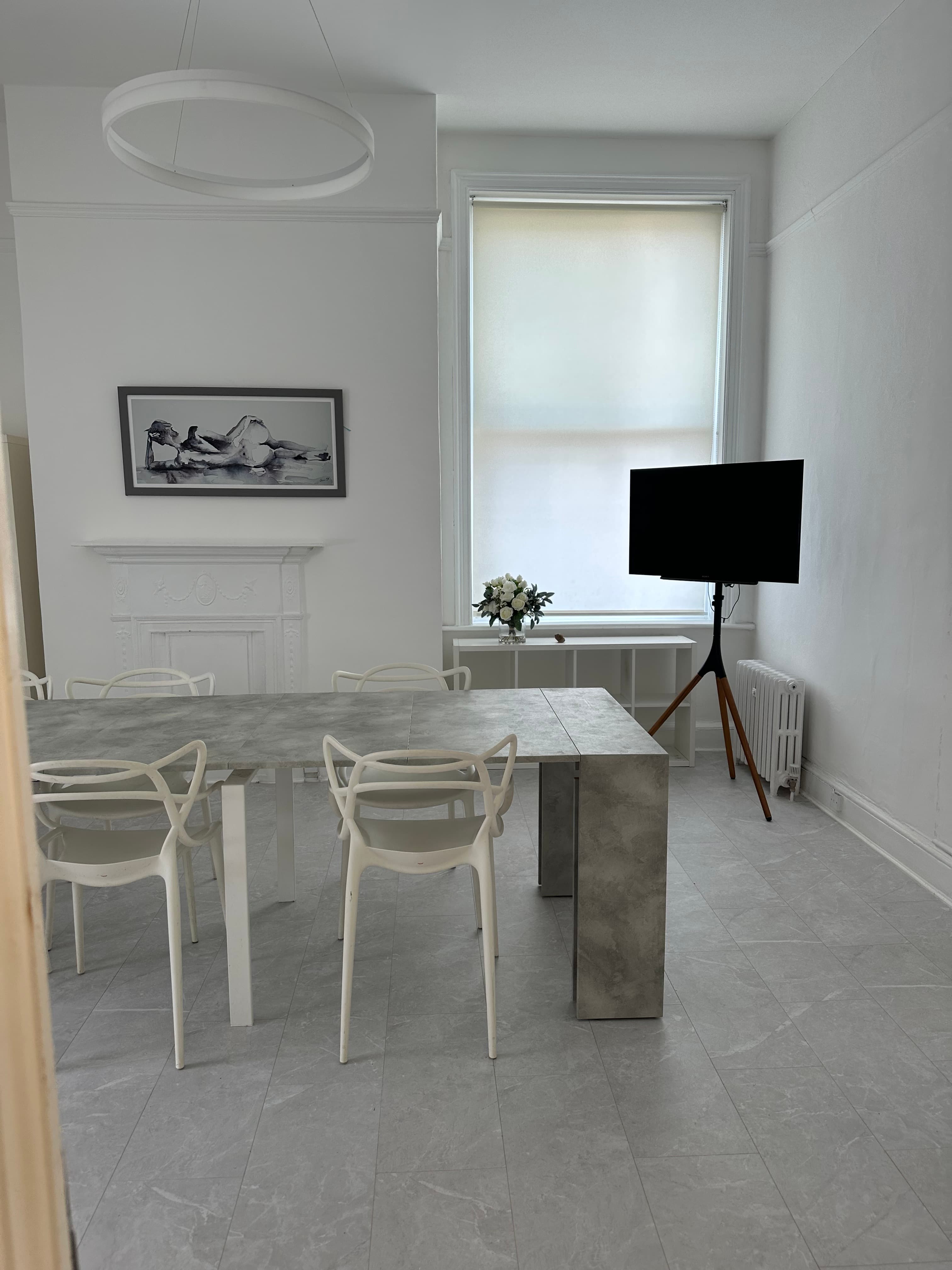 Minimalist boardroom for workshops and consultations at Spaces 6 Kings Buildings.