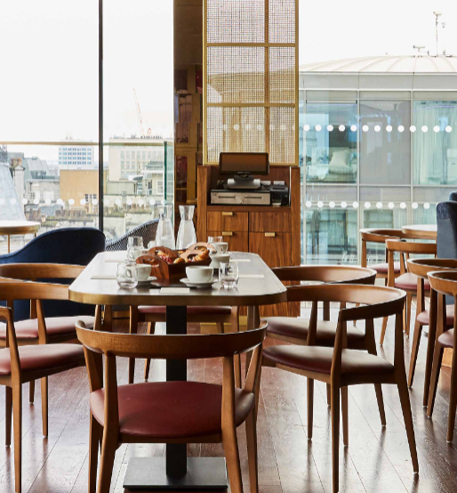 Modern boardroom at The View Leicester Square with floor-to-ceiling city views for VIP meetings.