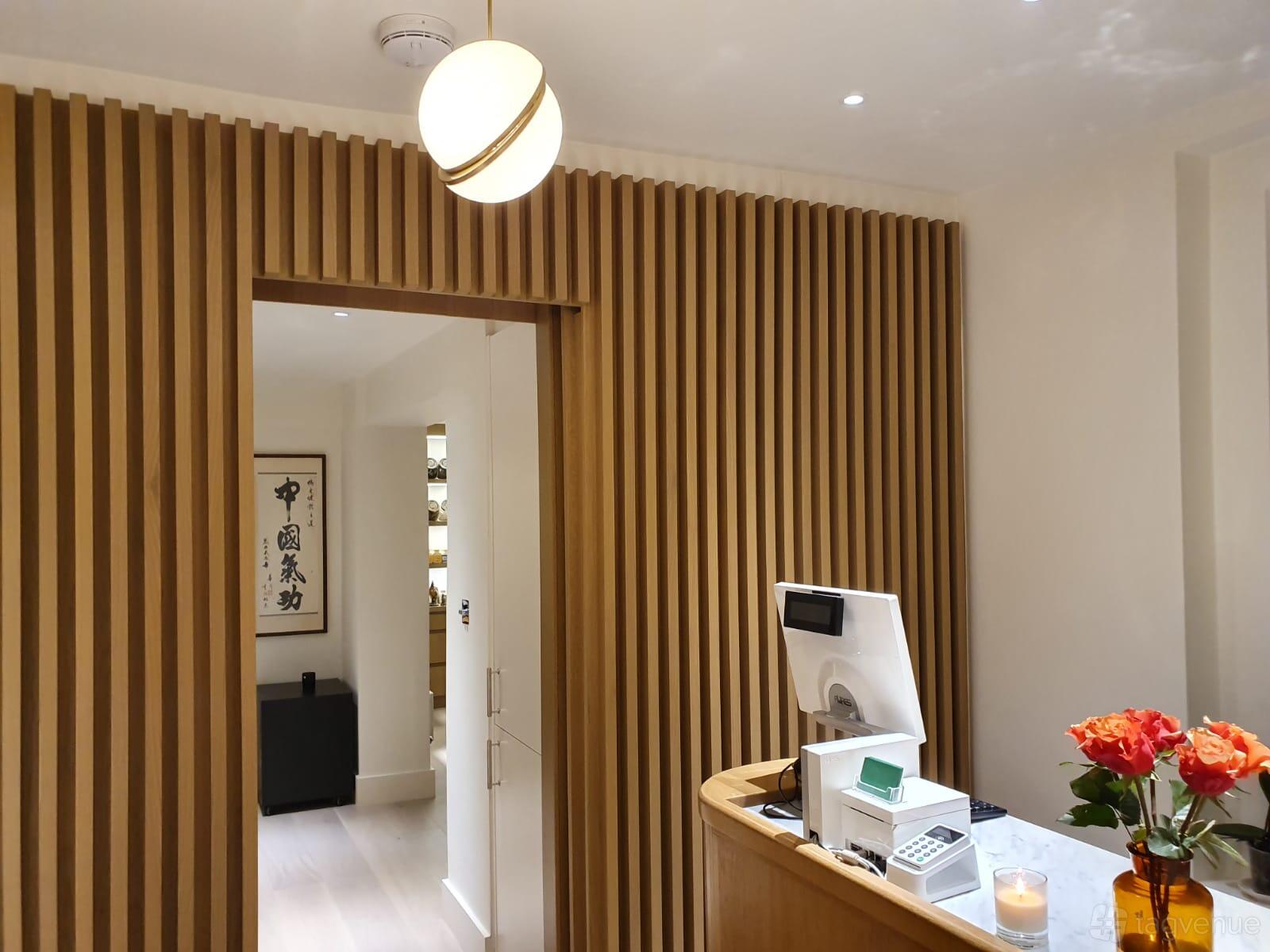 Main Training Hall, inviting wooden reception area, perfect for professional meetings.