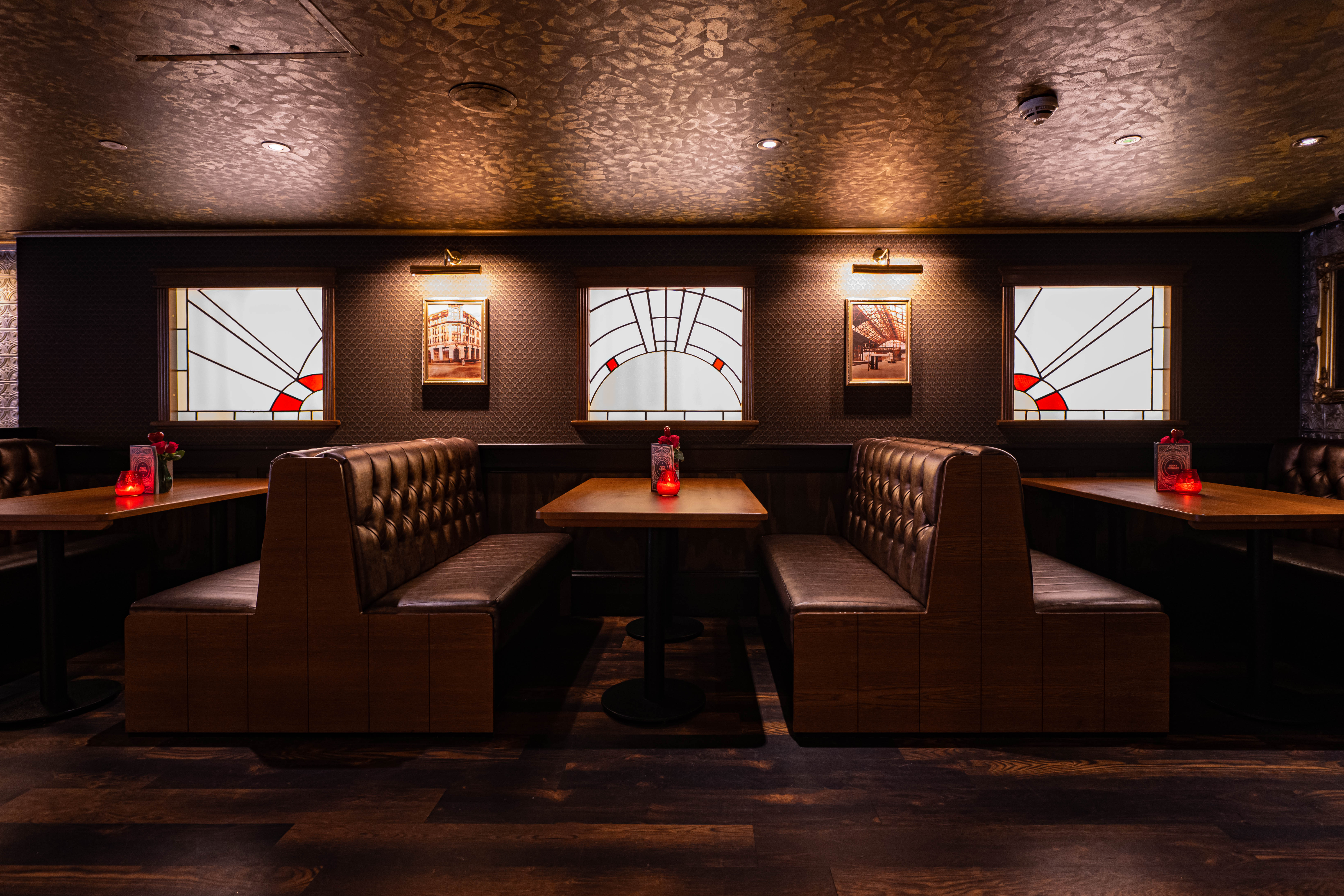 Cozy booth seating at The Garrison, ideal for private dinners and small events in Manchester.