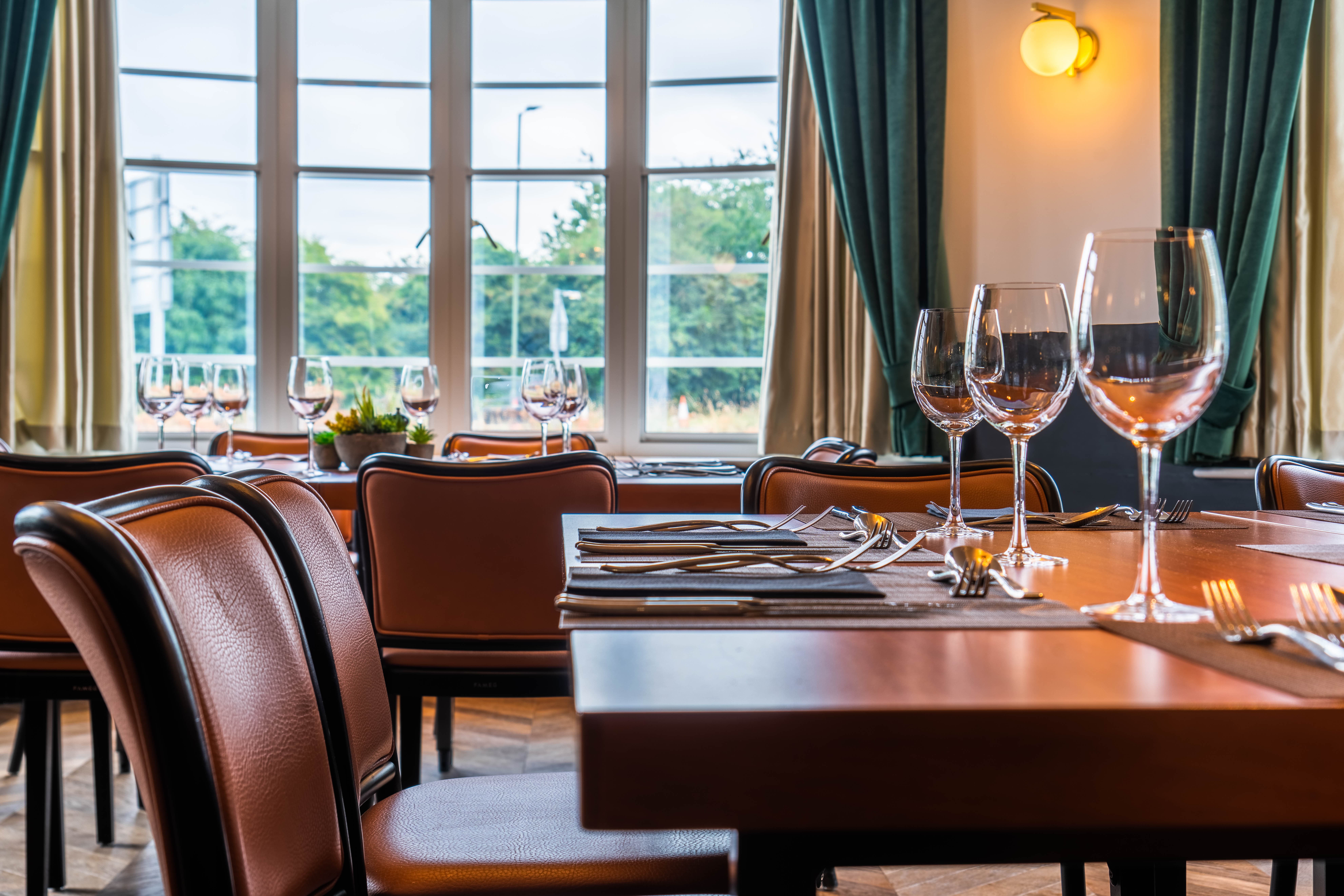 Botanical Room at The Comet Hotel: Boardroom set for executive networking and dinner meetings.