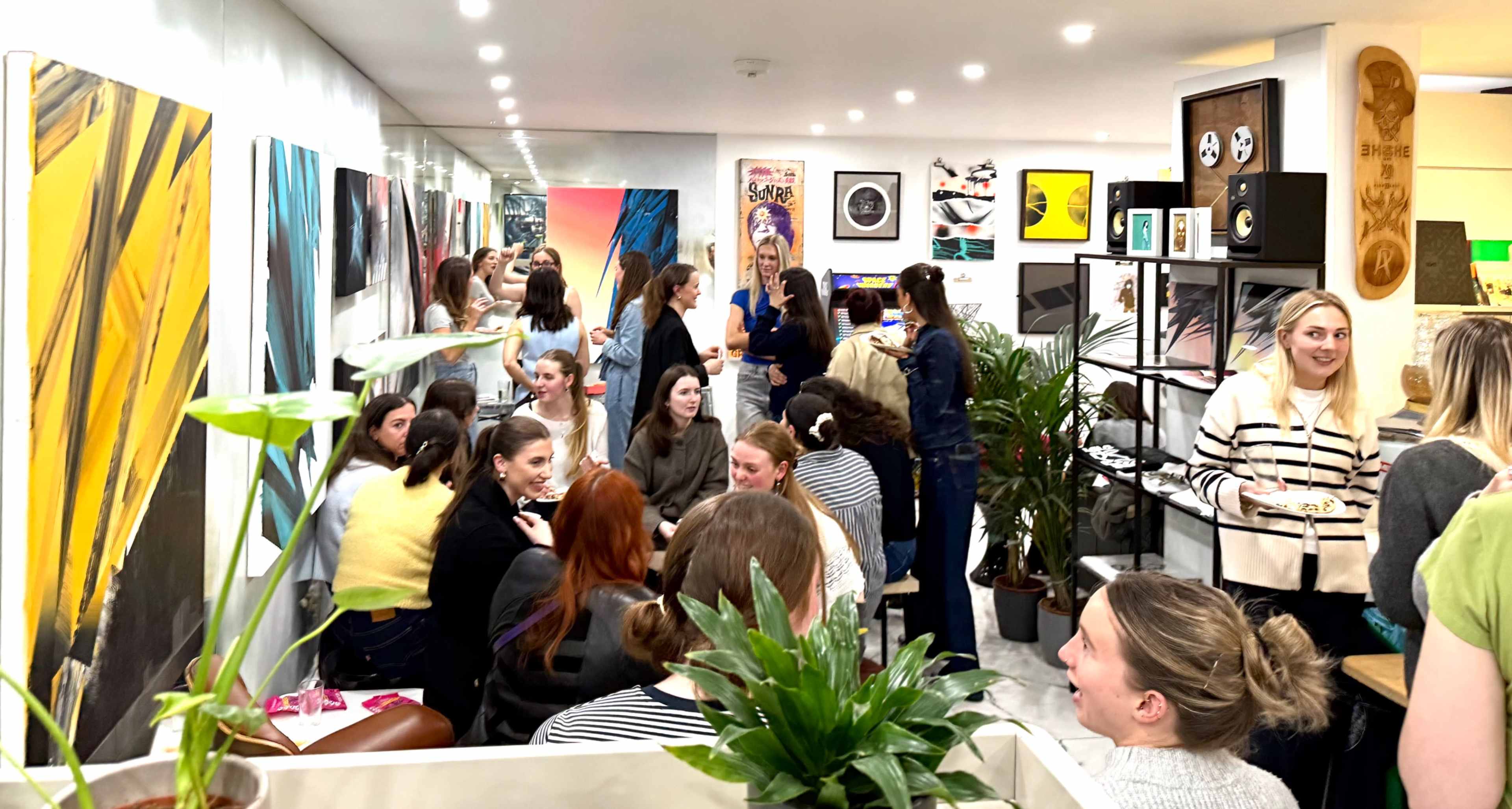 "Vibrant networking event at BORO Cafe bar, Edinburgh; stylish decor fosters connections."