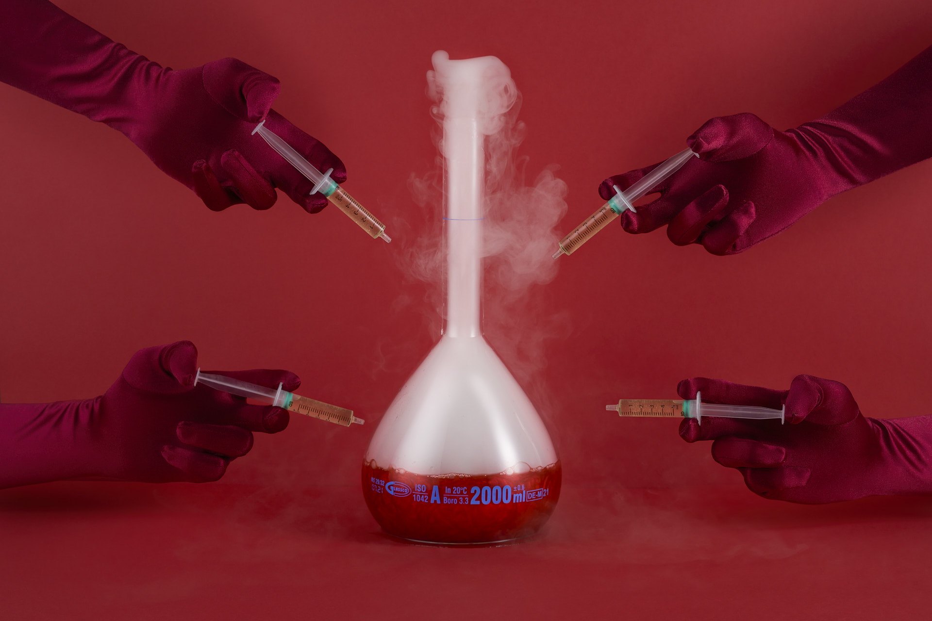 Dynamic cafe bar in BORO, Edinburgh, with a red backdrop for engaging science-themed events.