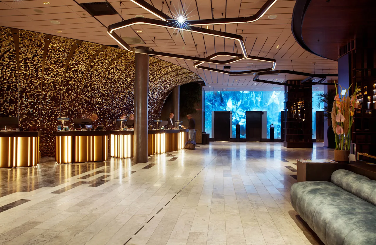 Sophisticated hotel restaurant lobby with stylish decor for events and meetings.