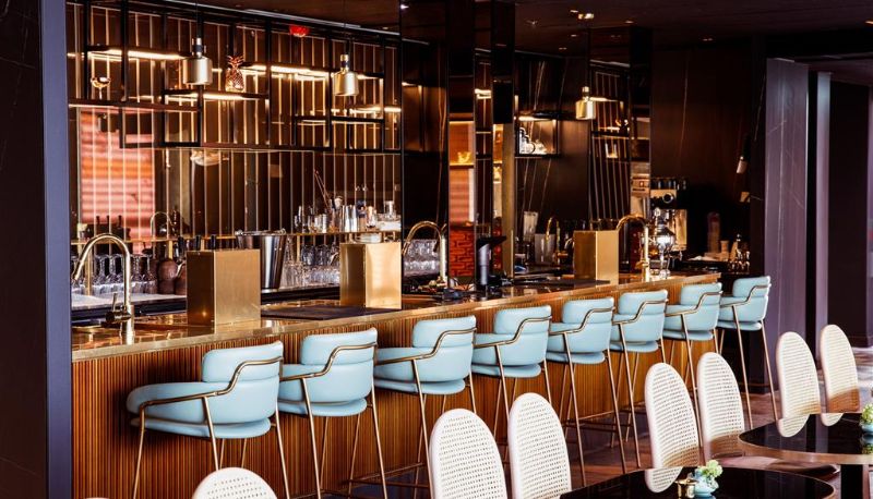 Sleek bar at Clarion Hotel The Hub, perfect for cocktail receptions and networking.