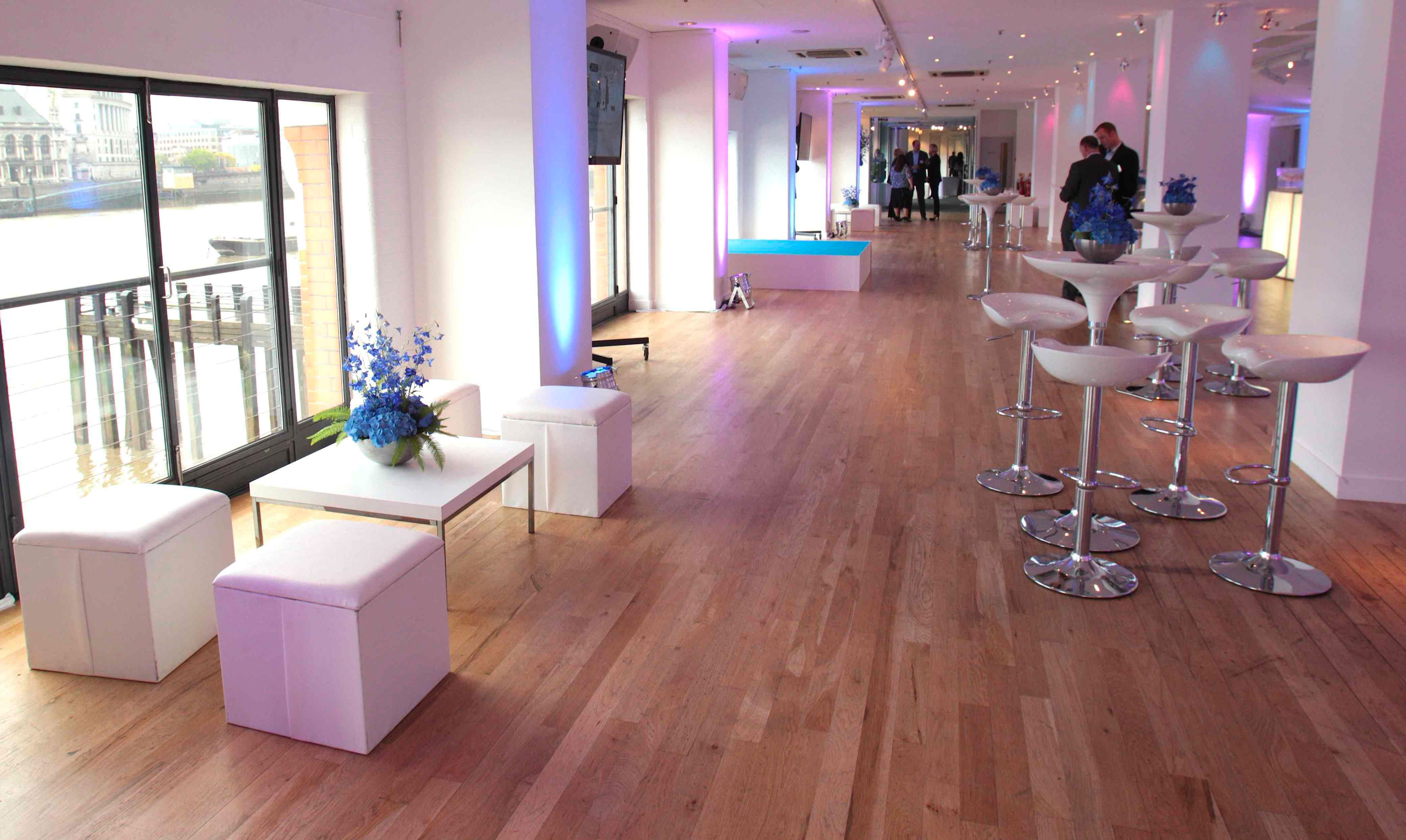 Stylish OXO2 Level Two event space with modern furniture for networking and gatherings.