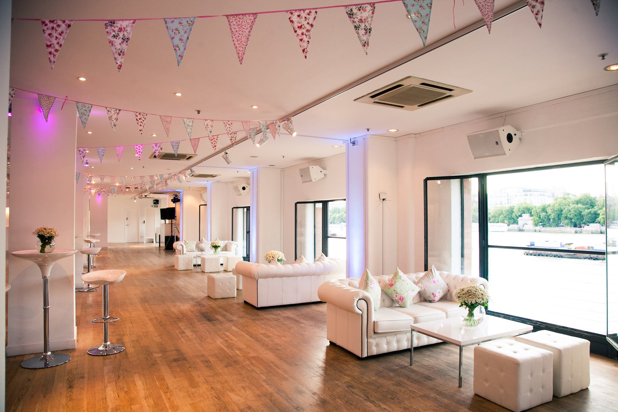 Stylish OXO2 event space with modern decor, ideal for networking and cocktail receptions.