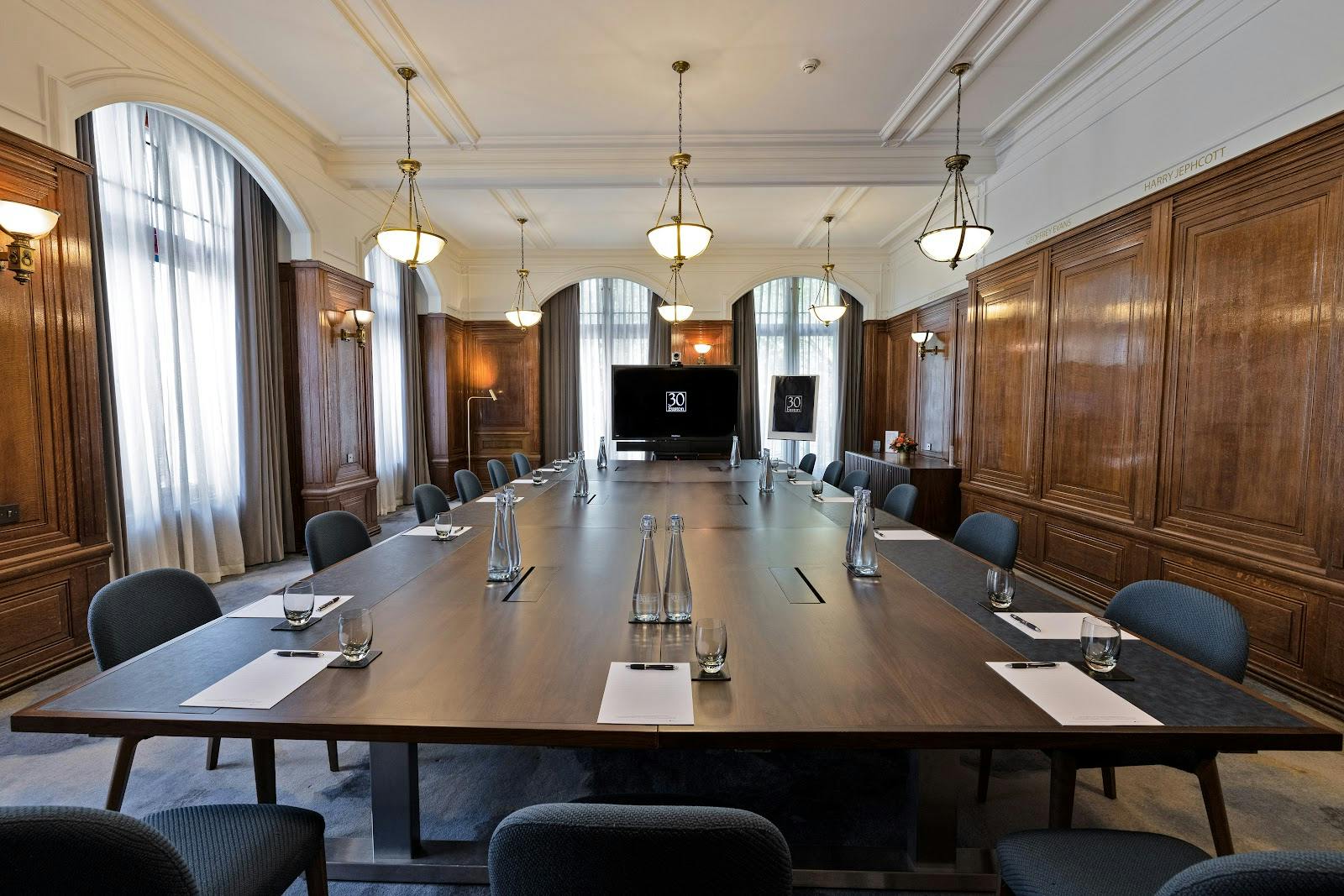 Boardroom at 30 Euston Square with elegant table for corporate events and meetings.