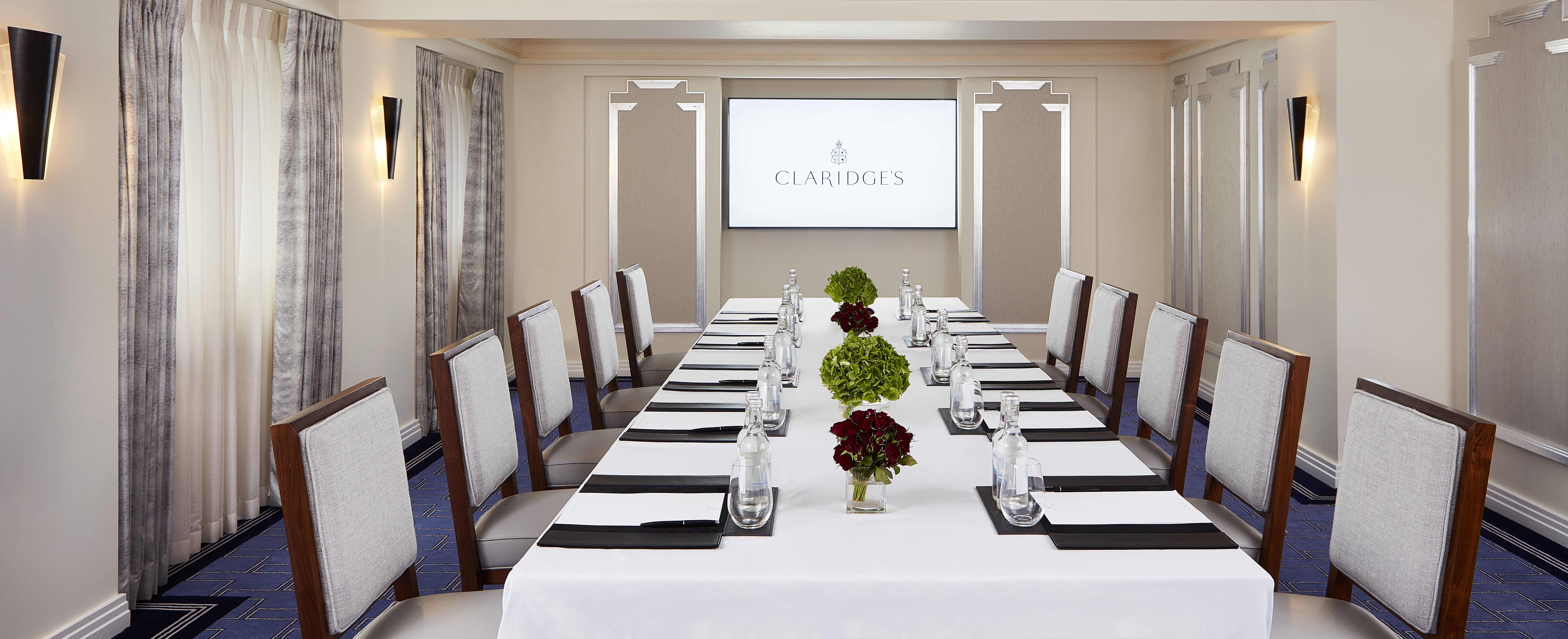 Highgrove Room at Claridge's, elegant meeting space for corporate events with AV equipment.