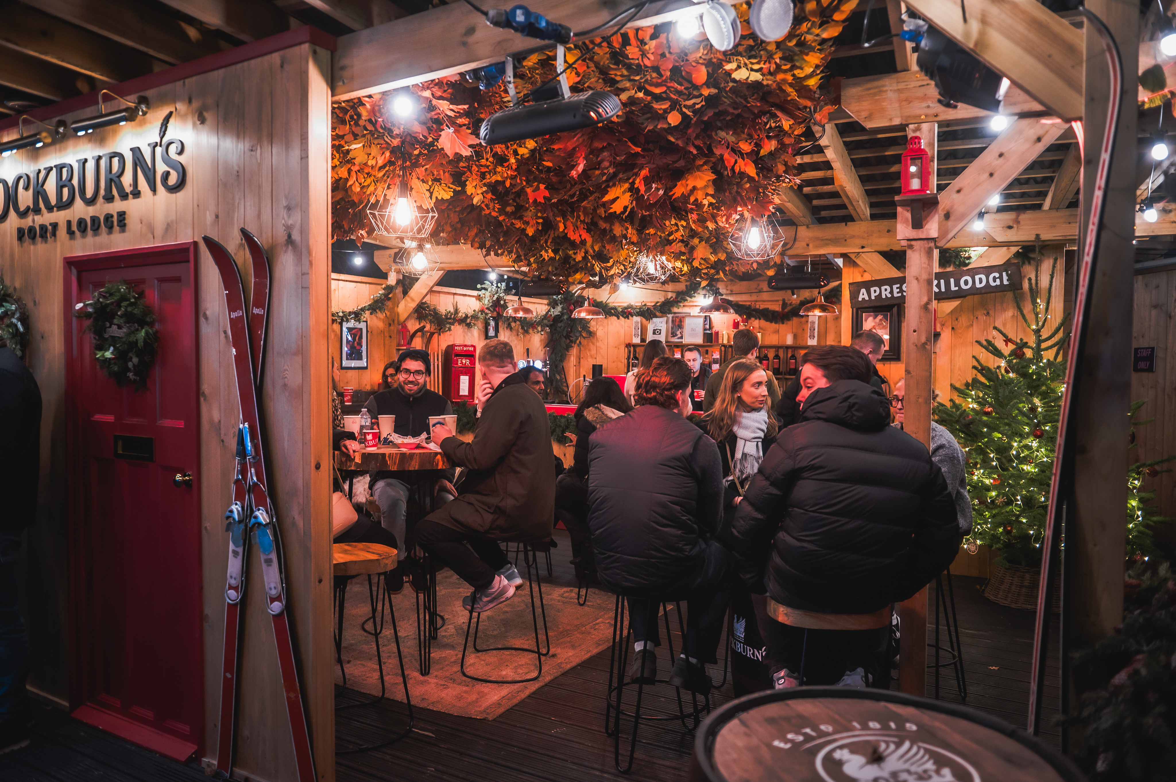 Cozy après-ski venue with rustic decor for winter events and holiday parties.