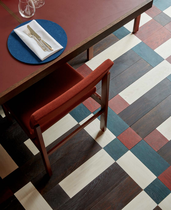 The Swiss Room breakout space with modern workstation for corporate workshops and client meetings.