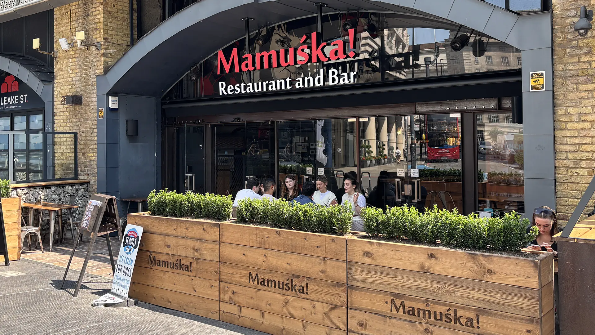 The Terrace at Mamuśka! Restaurant, vibrant outdoor space for casual gatherings.
