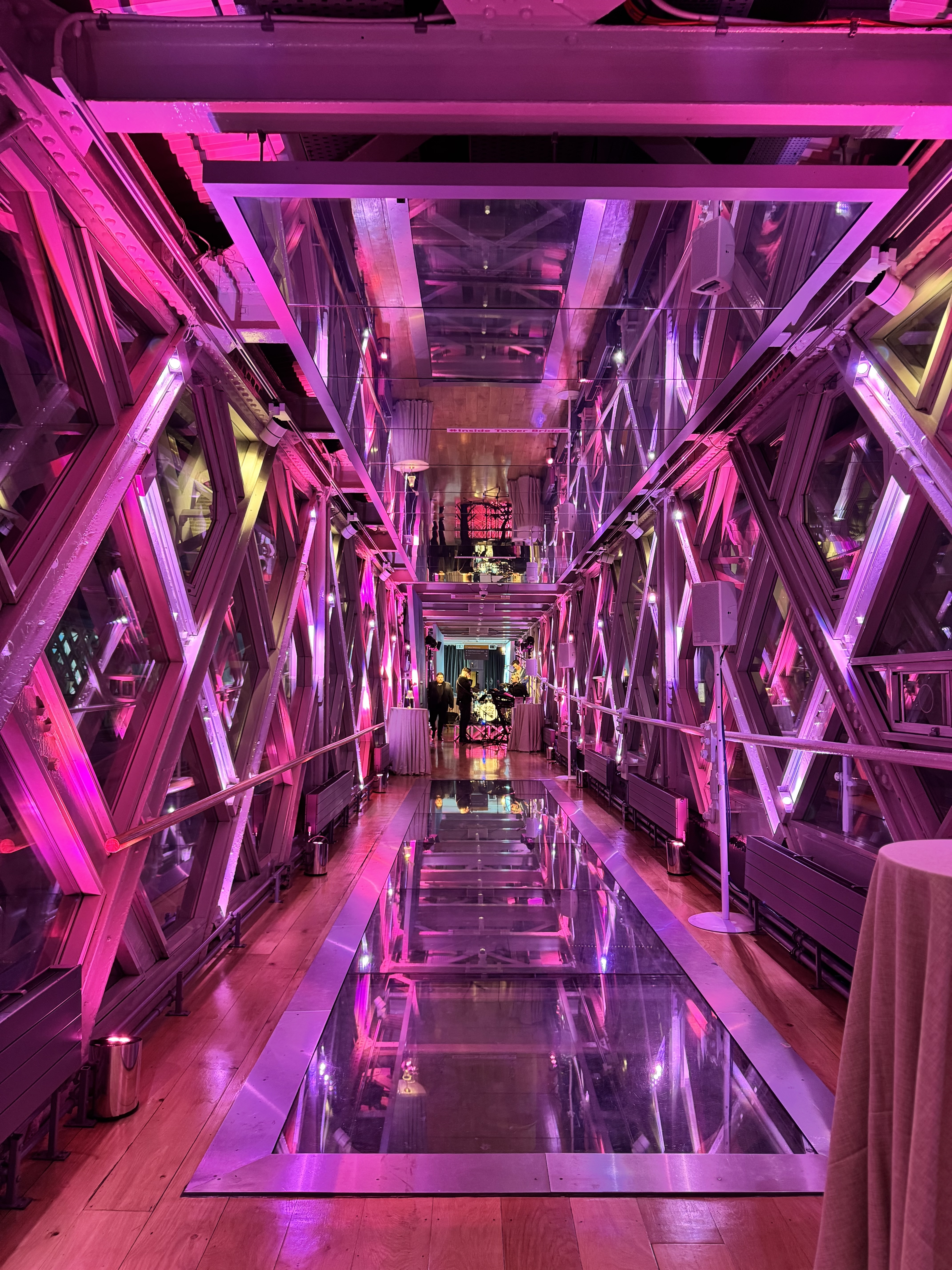 Sleek event space at HM Tower of London with pink lighting for meetings and celebrations.