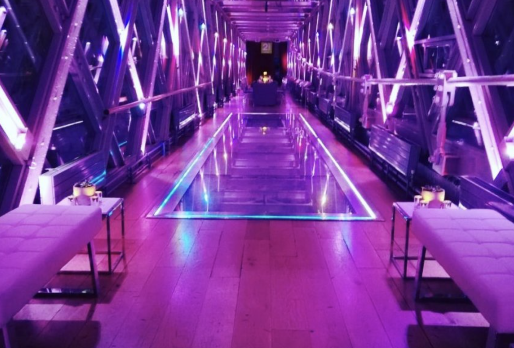 Sleek venue with vibrant purple lighting for corporate events at HM Tower of London.