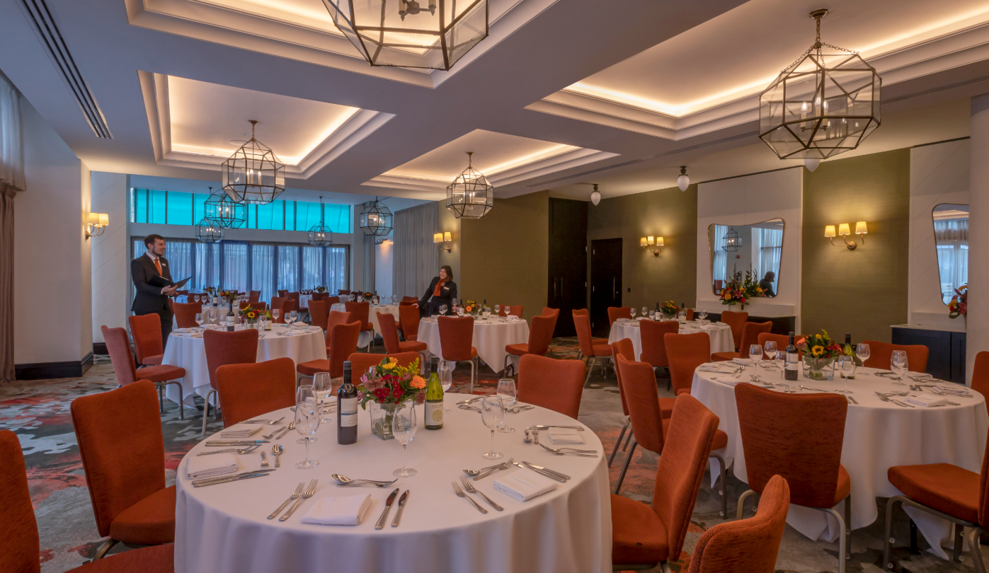 Marlowe Suite in Clayton Hotel: elegant meeting room with round tables, ideal for events.
