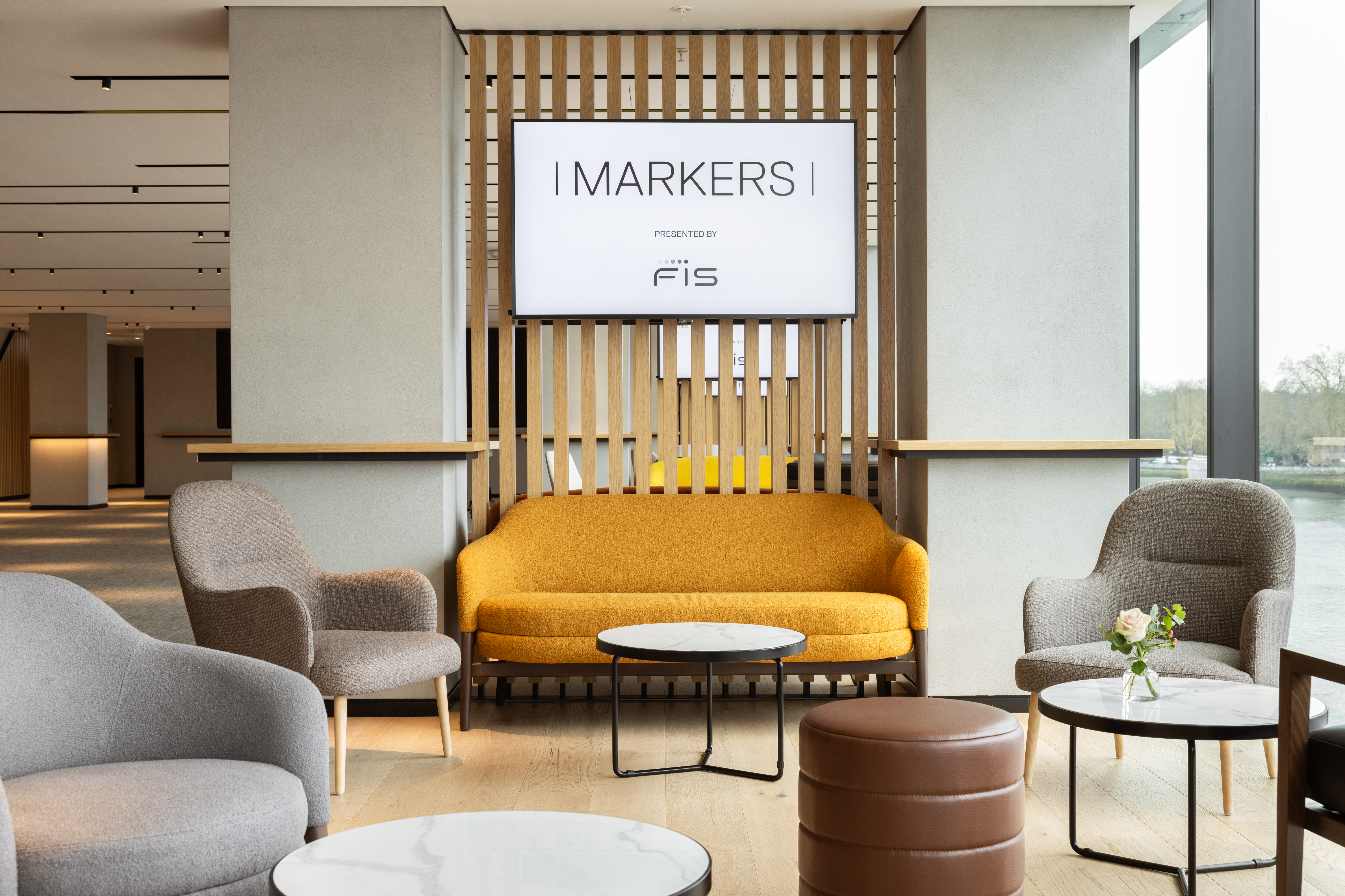 Stylish meeting space at Fulham Pier with modern decor, ideal for networking events.