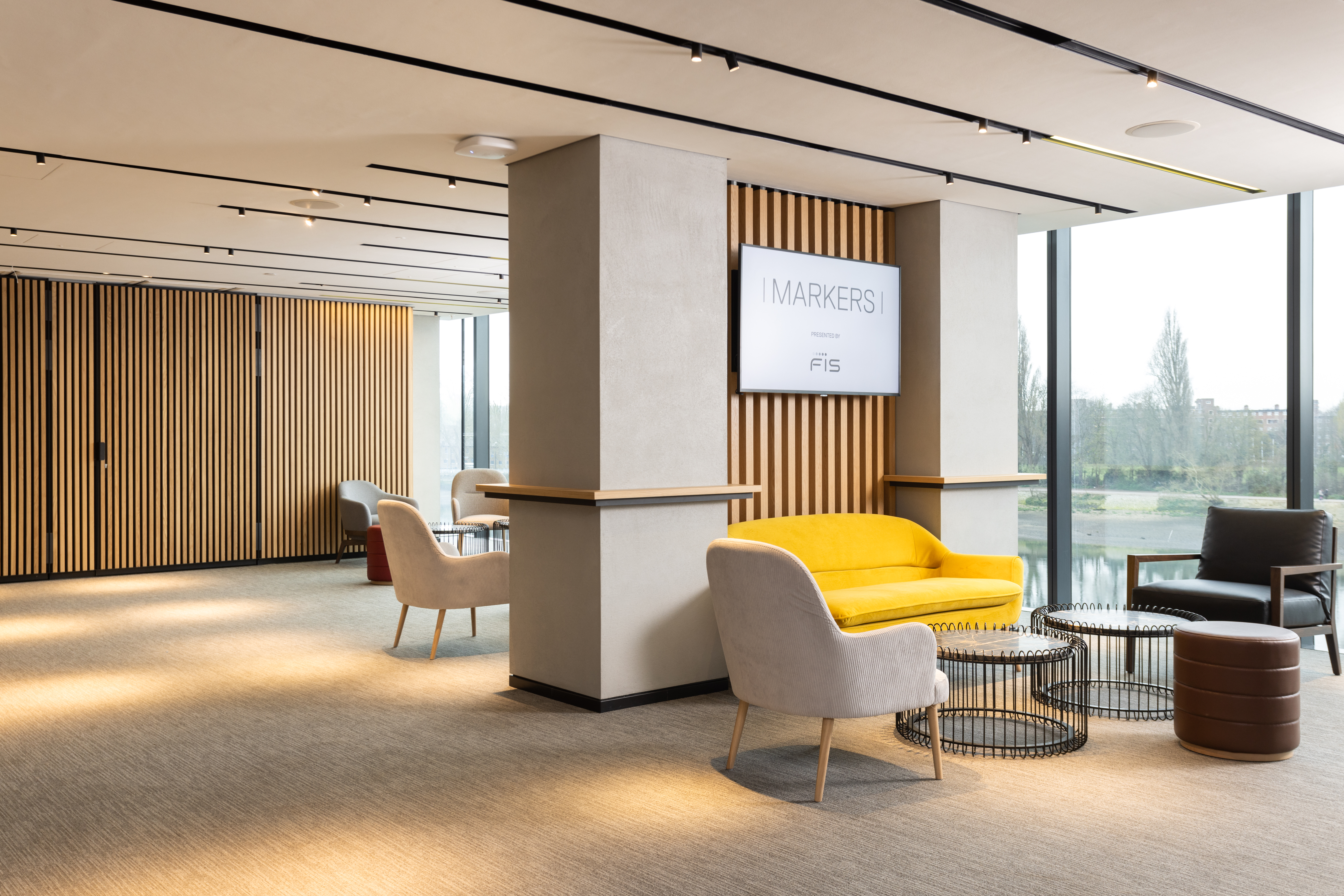 Modern meeting space at Fulham Pier with natural light, ideal for networking events.