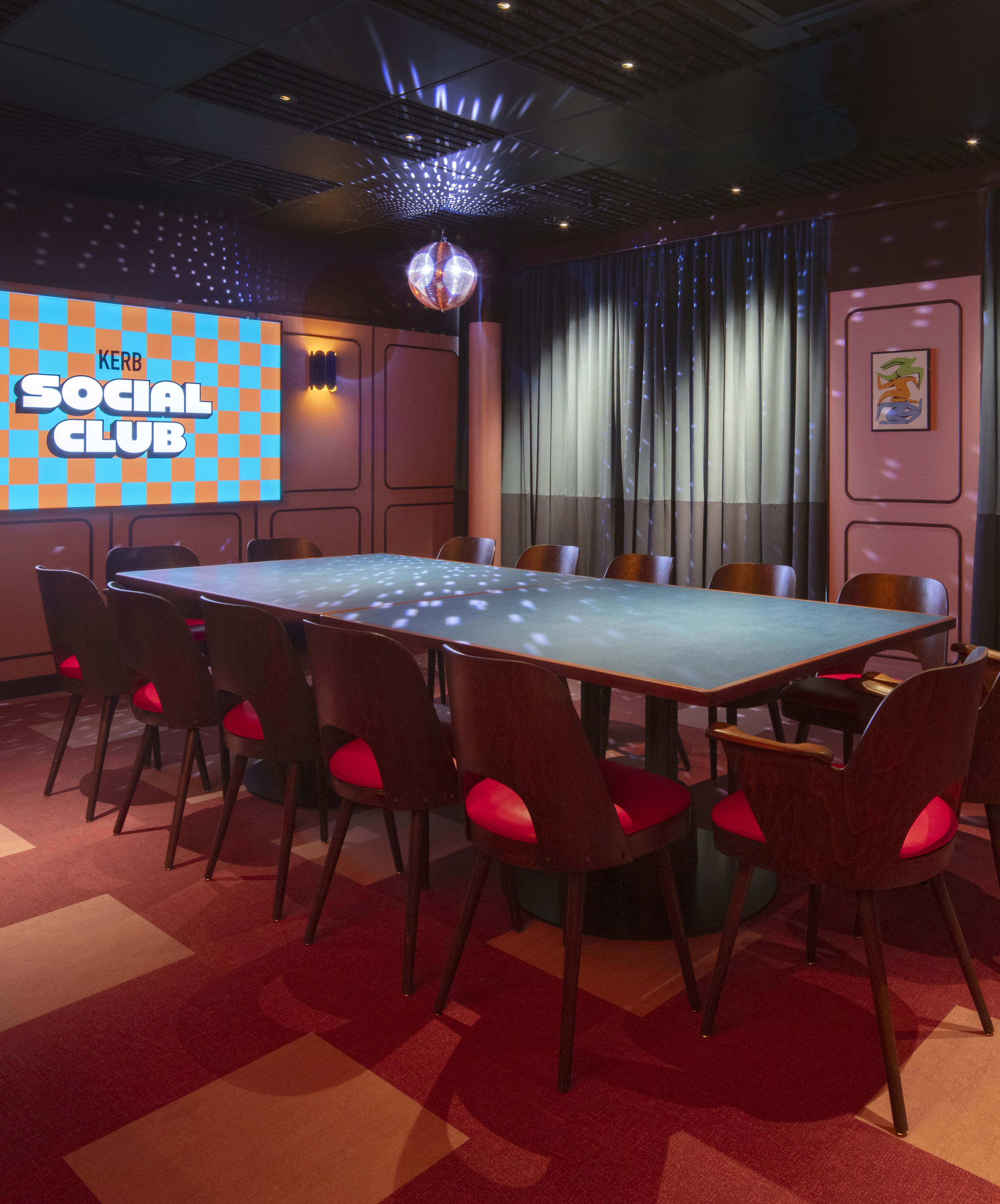 Modern meeting room in KERB Social Club, vibrant decor for creative events and networking.