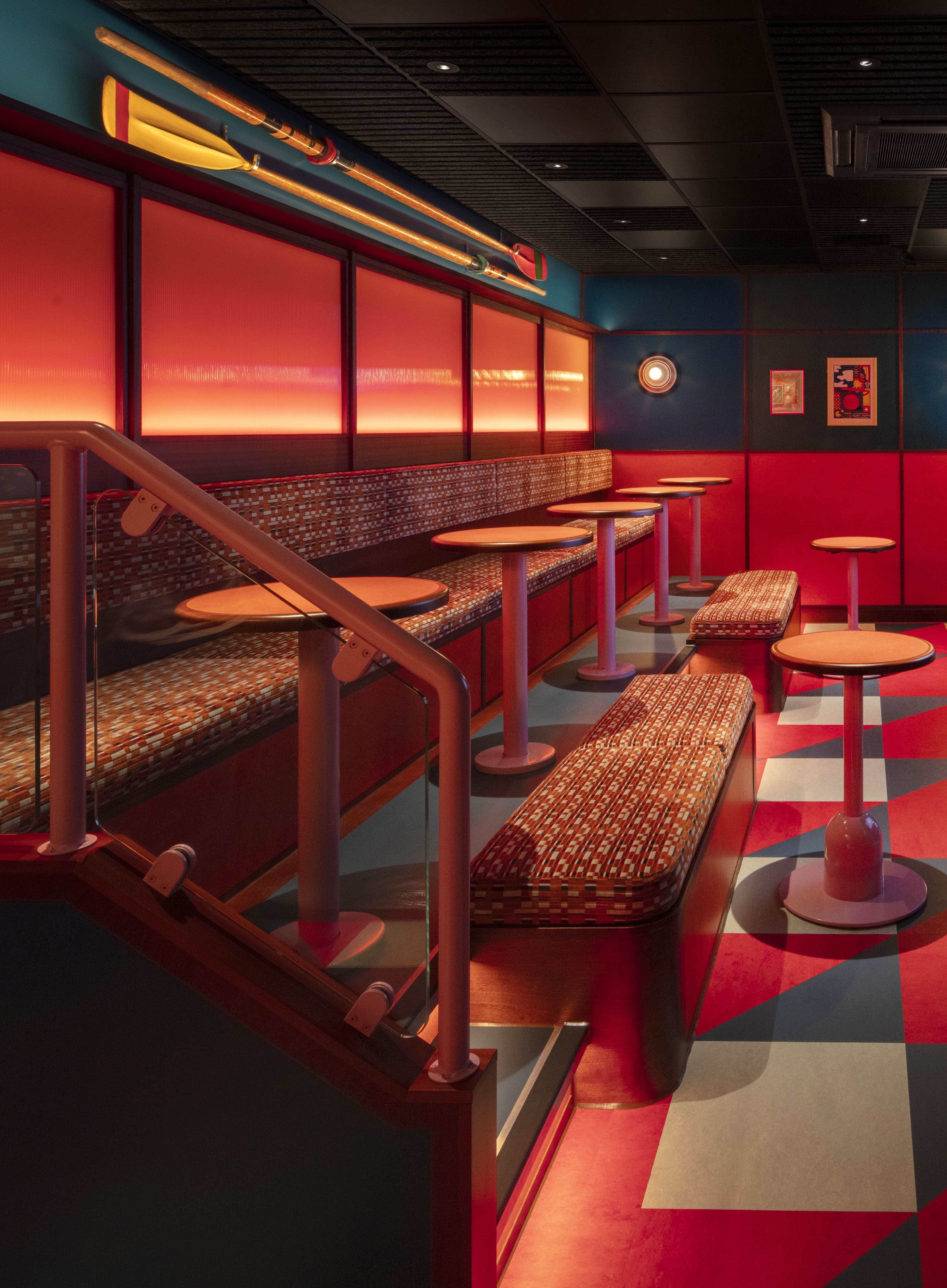 Vibrant retro Grandstand at KERB Social Club for networking and casual meetings.