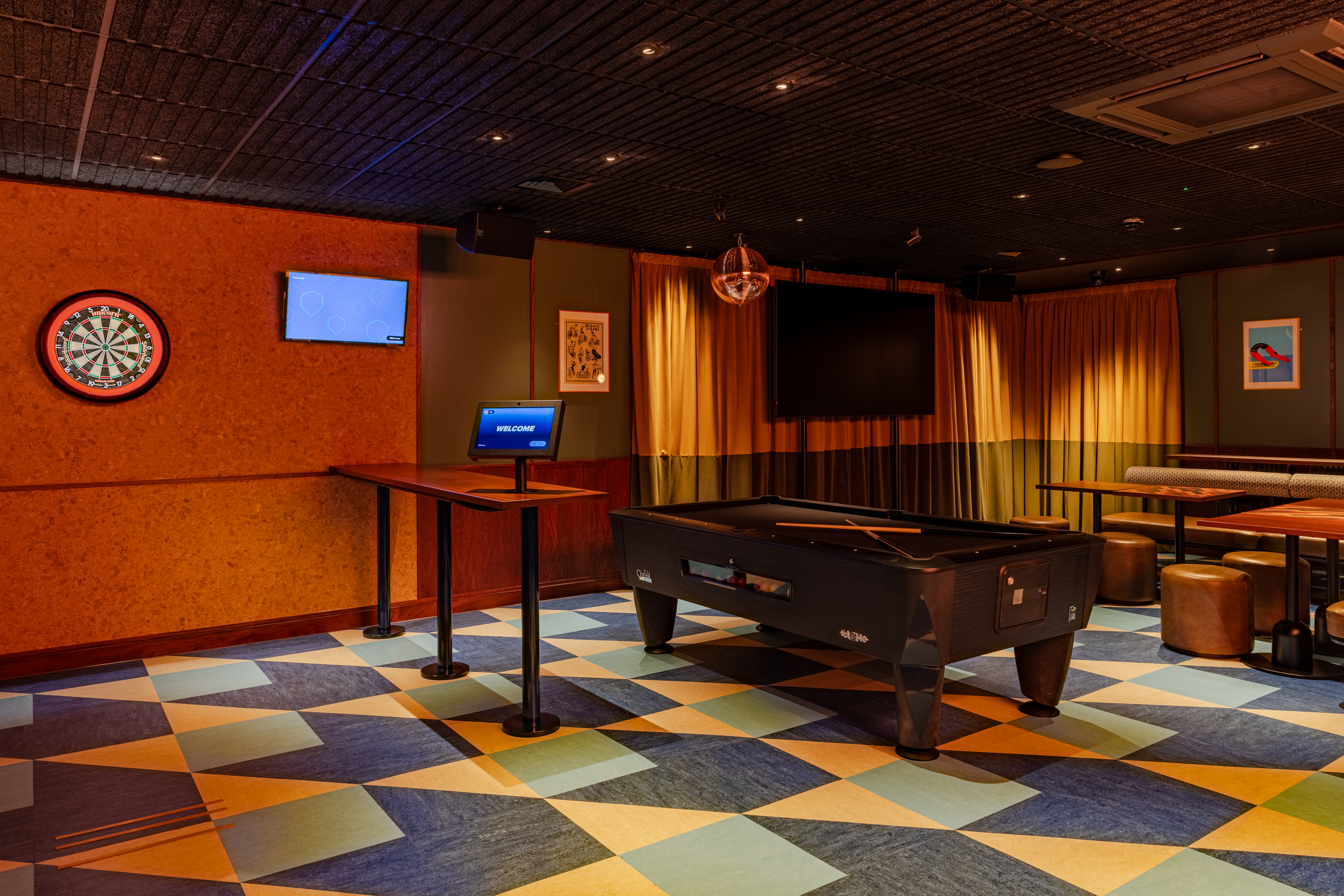 Vibrant event space at KERB Social Club with pool table, perfect for team-building activities.