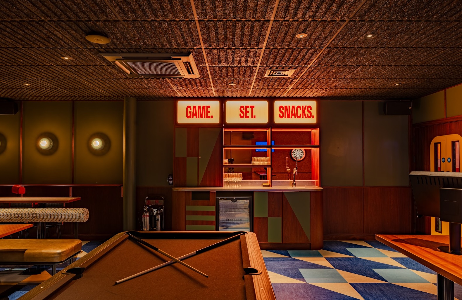 Vibrant Touchline space at KERB Social Club with pool table for team-building events.