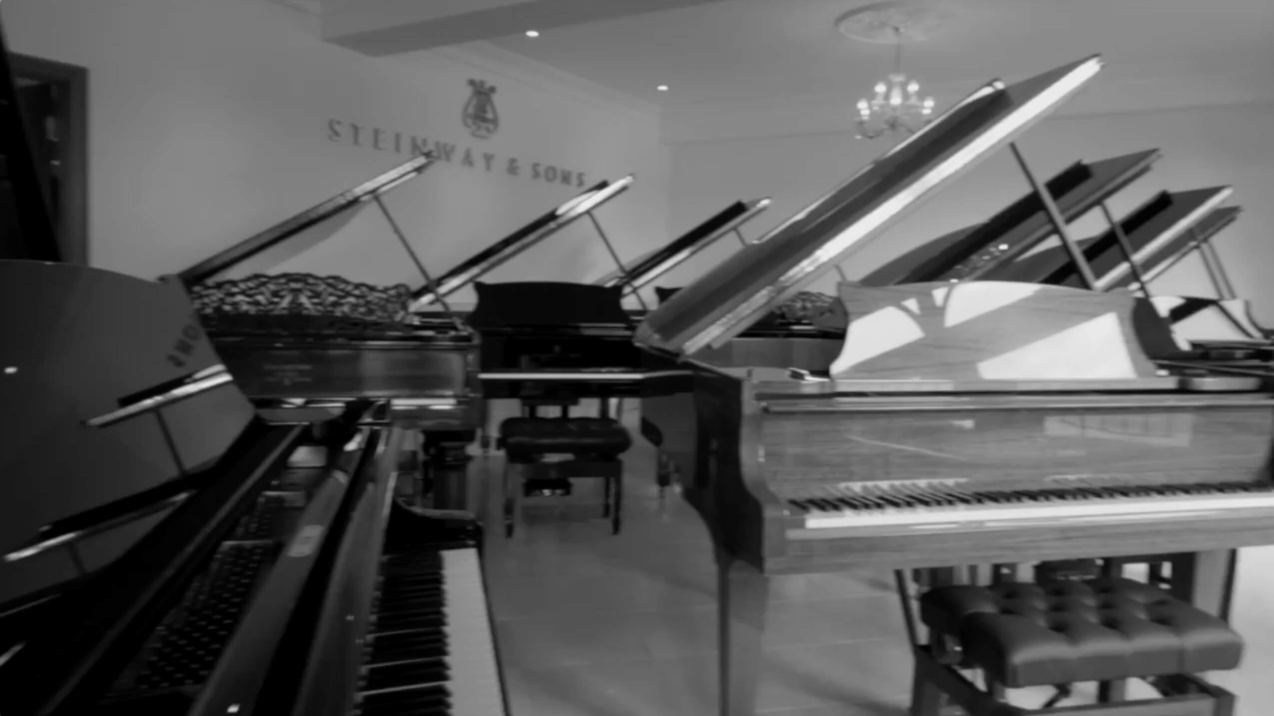 Luxury piano showroom venue for intimate VIP receptions and exclusive brand activations.