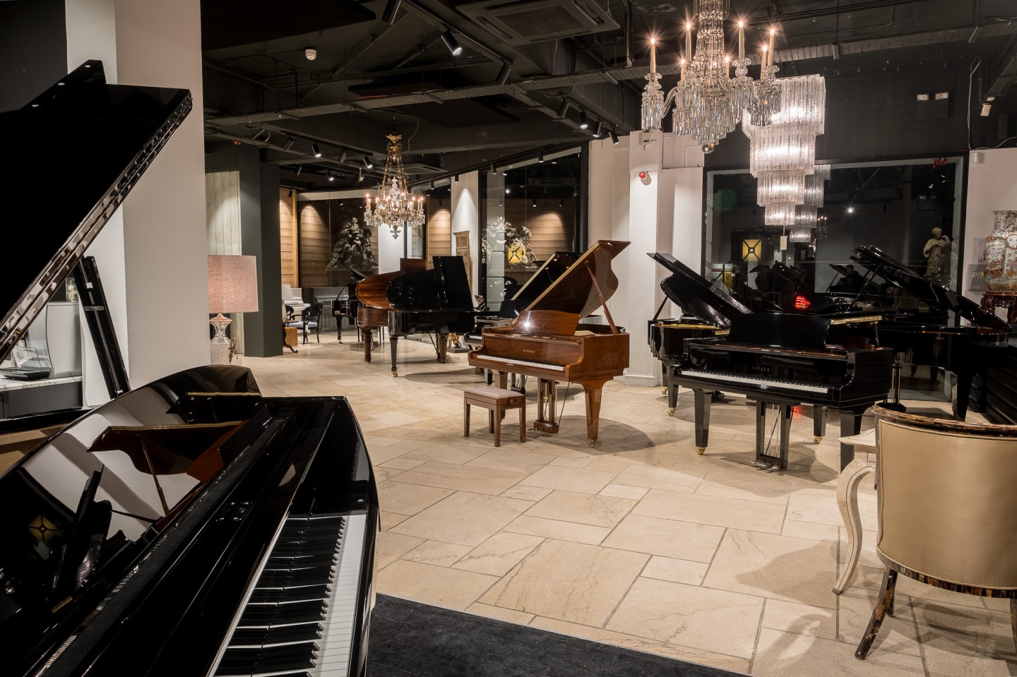 Luxury grand piano showroom venue for corporate receptions and elegant gala events.