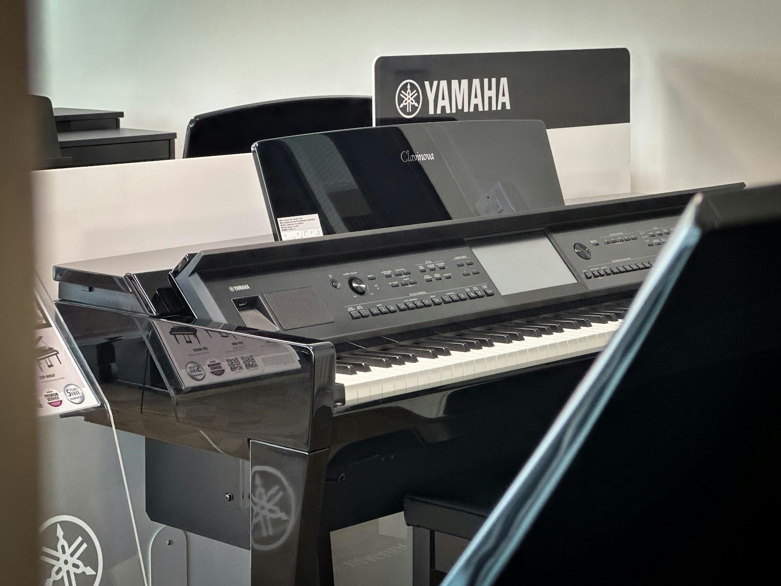 Yamaha Clavinova digital piano in piano showroom for corporate gala or professional event.