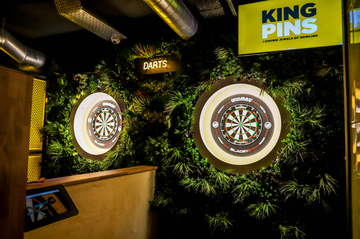 Vibrant darts area at King Pins, ideal for corporate events and casual gatherings.
