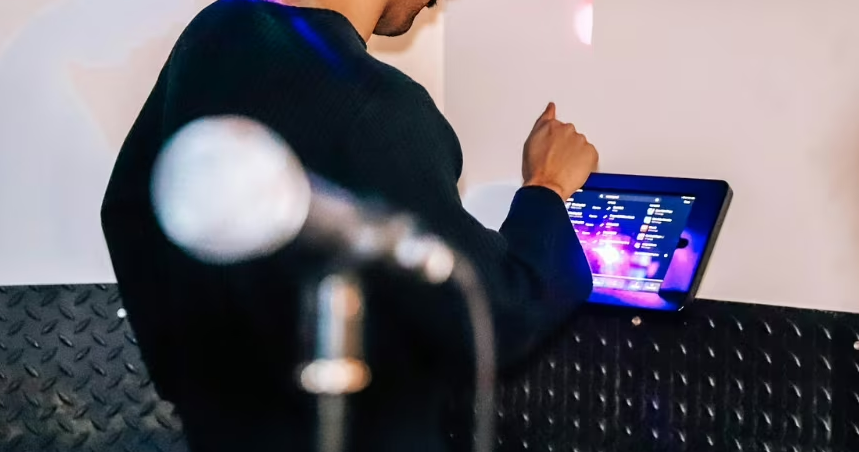 Karaoke room in King Pins Bristol with touchscreen for engaging events and presentations.