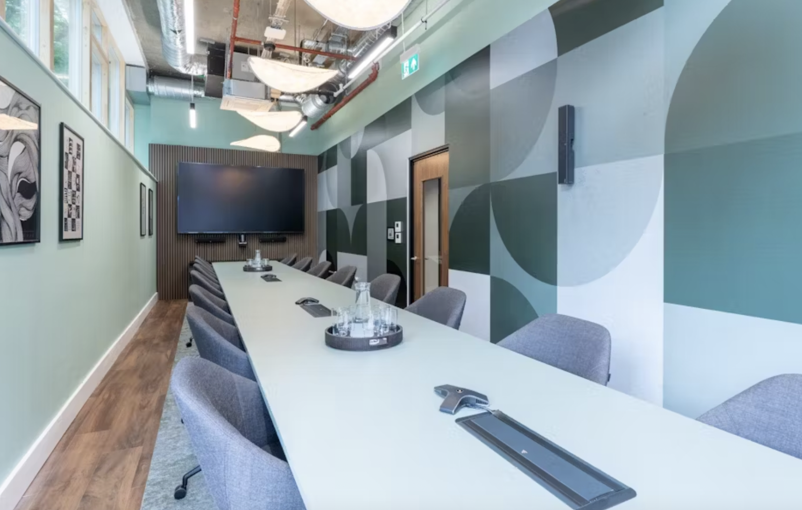 Modern conference room at Runway East, ideal for meetings and events with high-tech features.