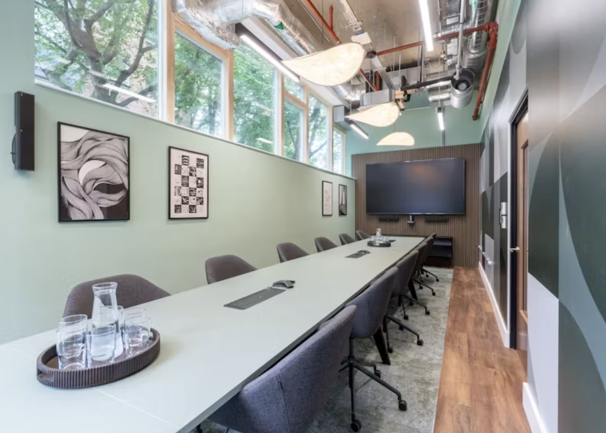 Modern meeting room with large windows for corporate events at Runway East Borough High Street.