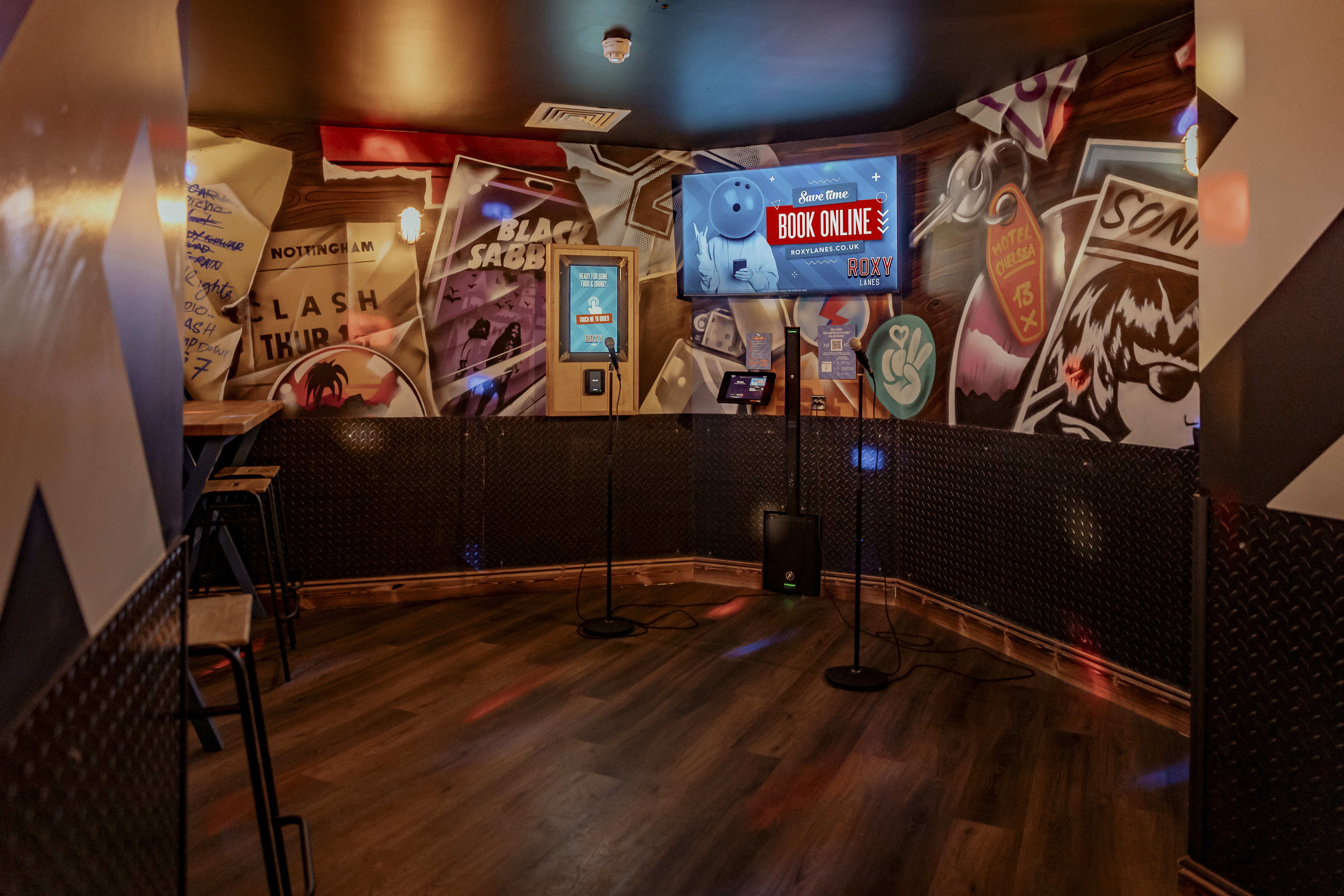 Vibrant karaoke room at Roxy Lanes, ideal for corporate outings and social mixers.