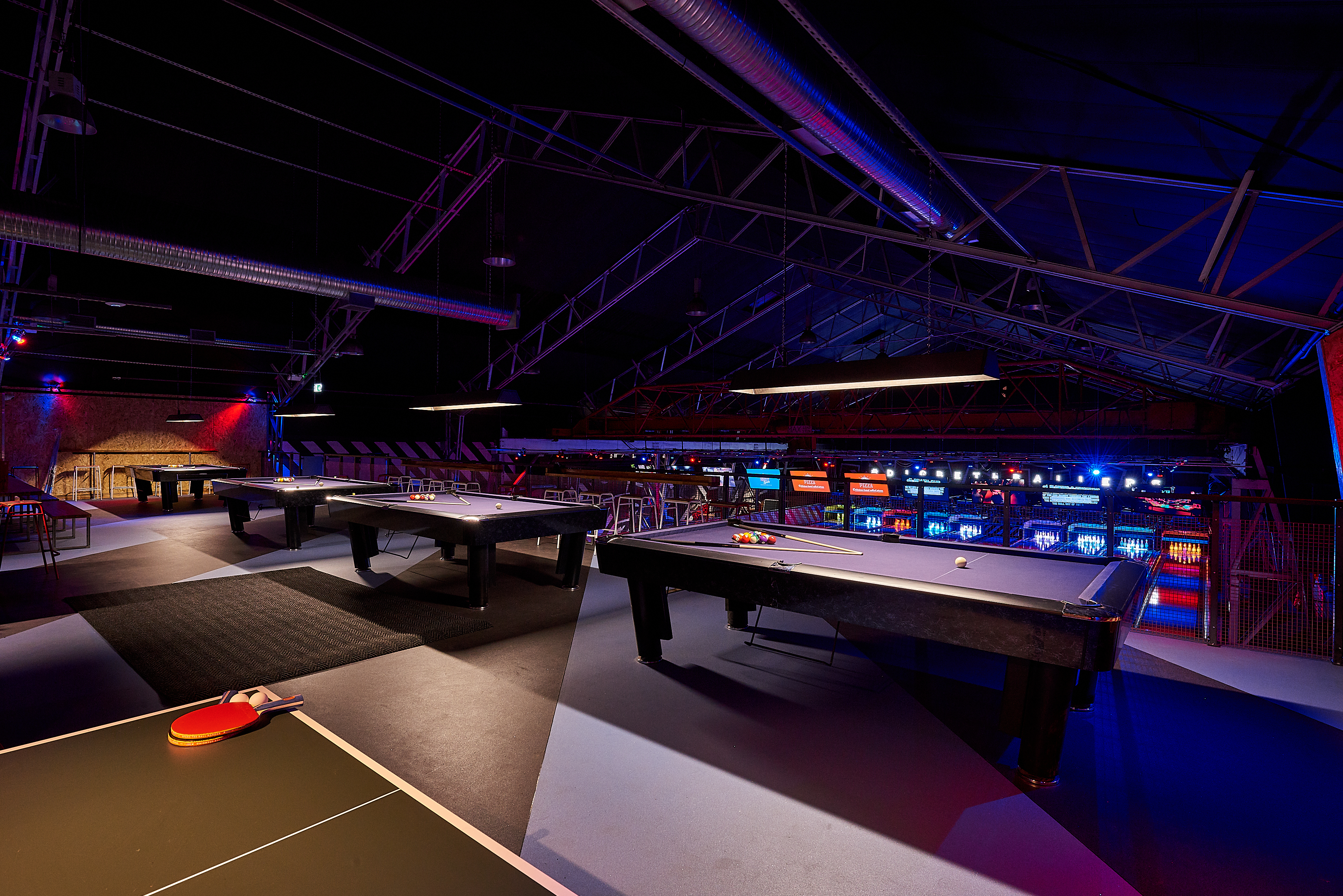 Full venue hire at Roxy Lanes, Birmingham with vibrant lighting for corporate events.