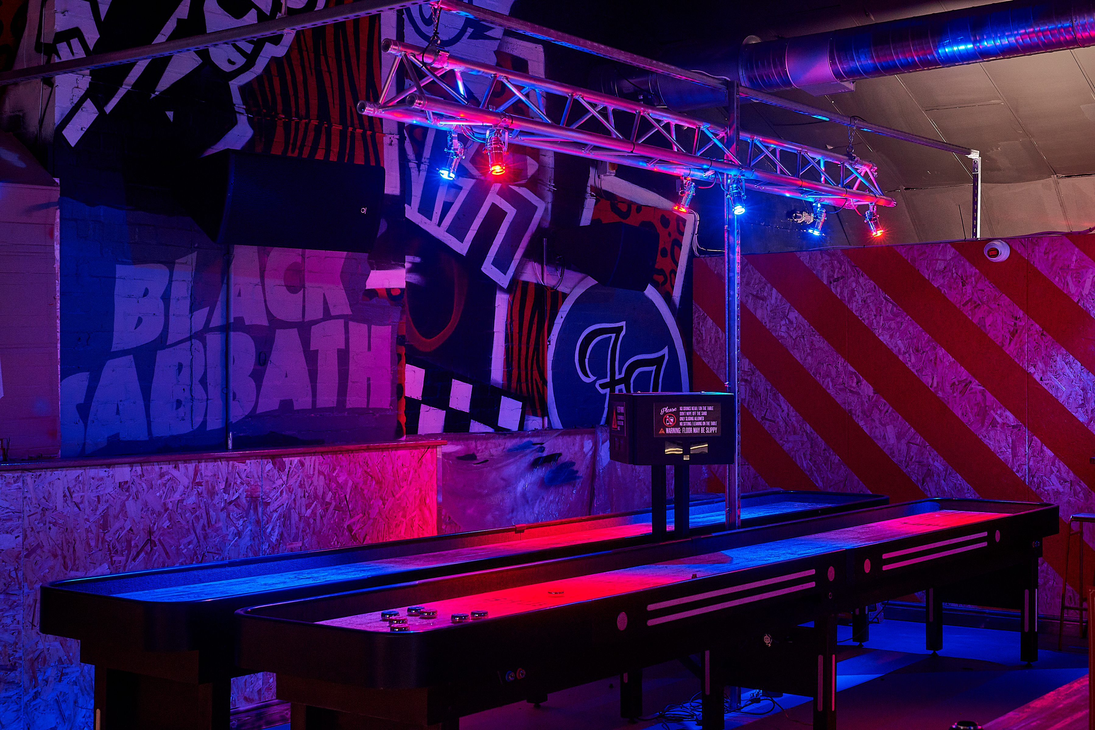 Vibrant Roxy Lanes venue hire in Birmingham with shuffleboard for events and parties.