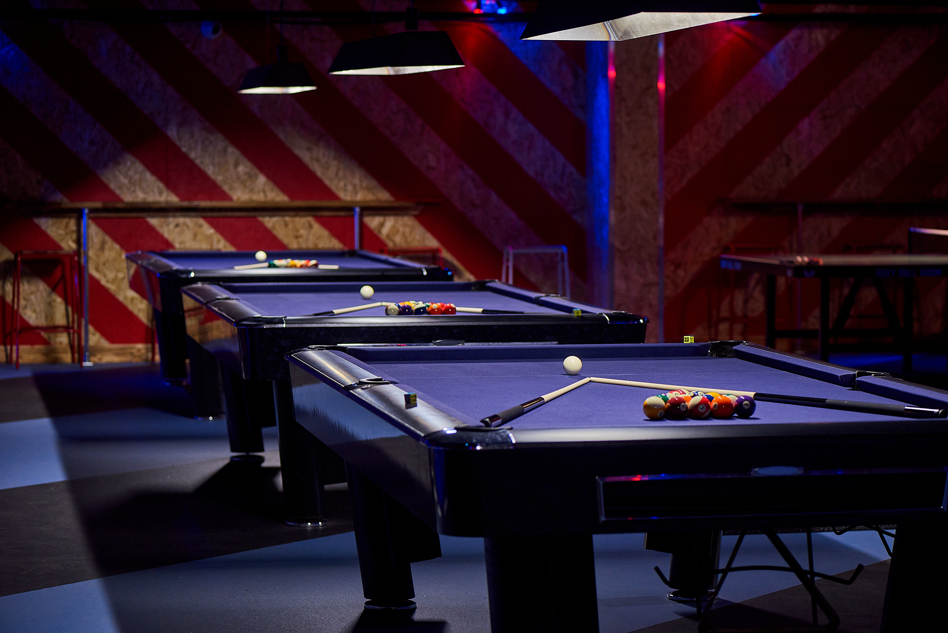 Stylish billiards area at The Balcony, Roxy Lanes for networking and team-building events.