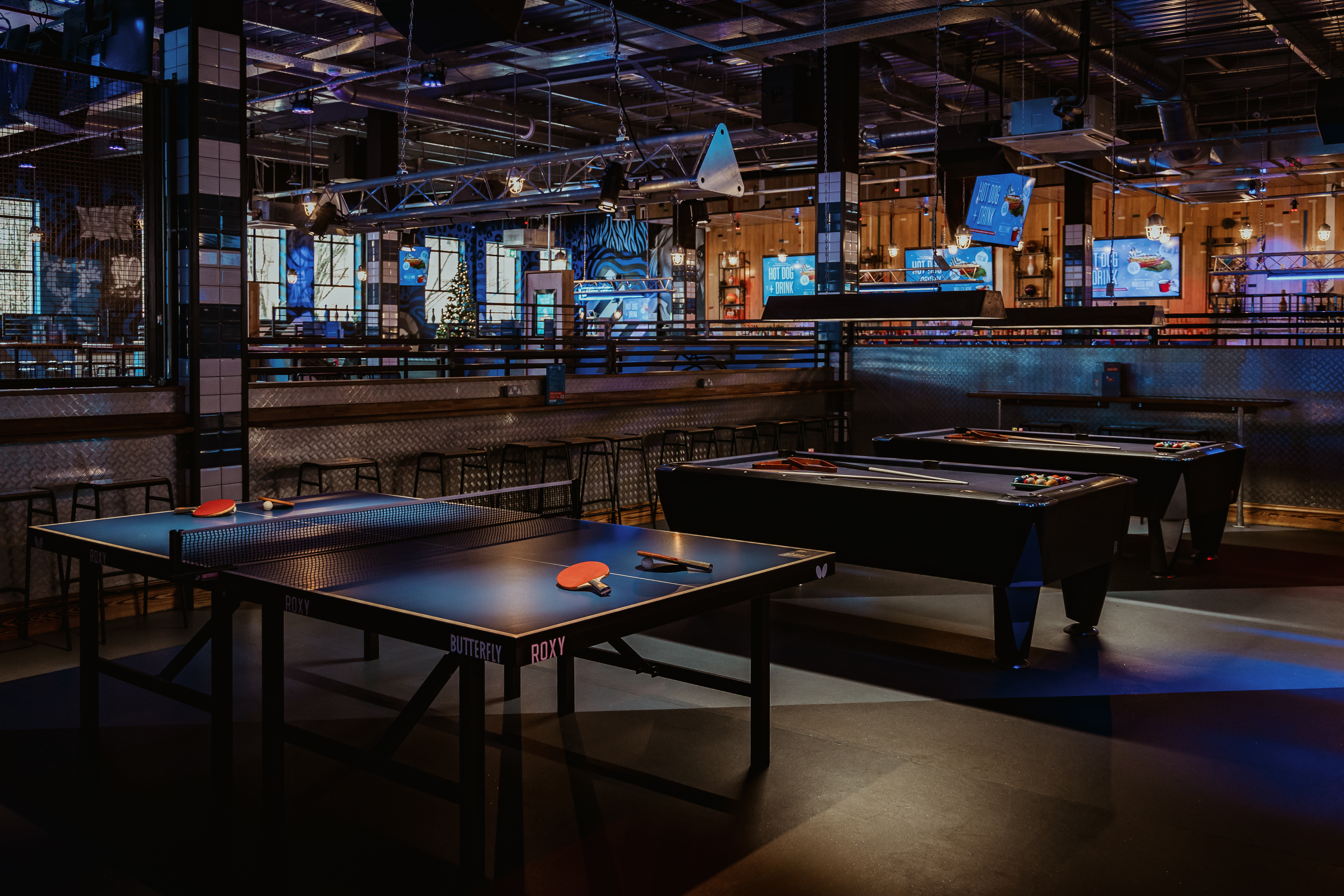 Modern event space at Roxy Lanes, Bristol with ping pong tables for networking and fun.