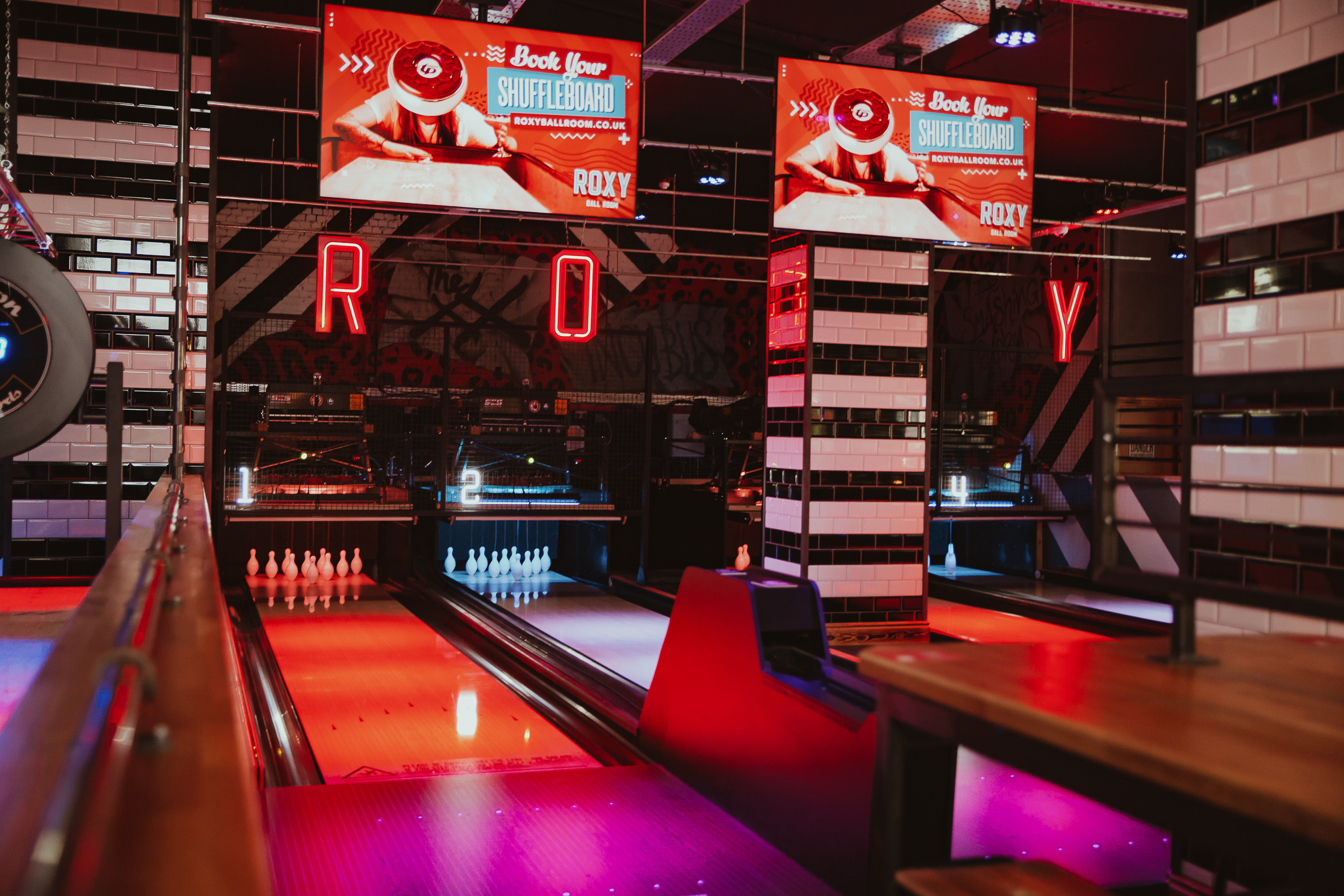 Vibrant bowling alley venue in Roxy Ball Room, perfect for corporate events and team-building.