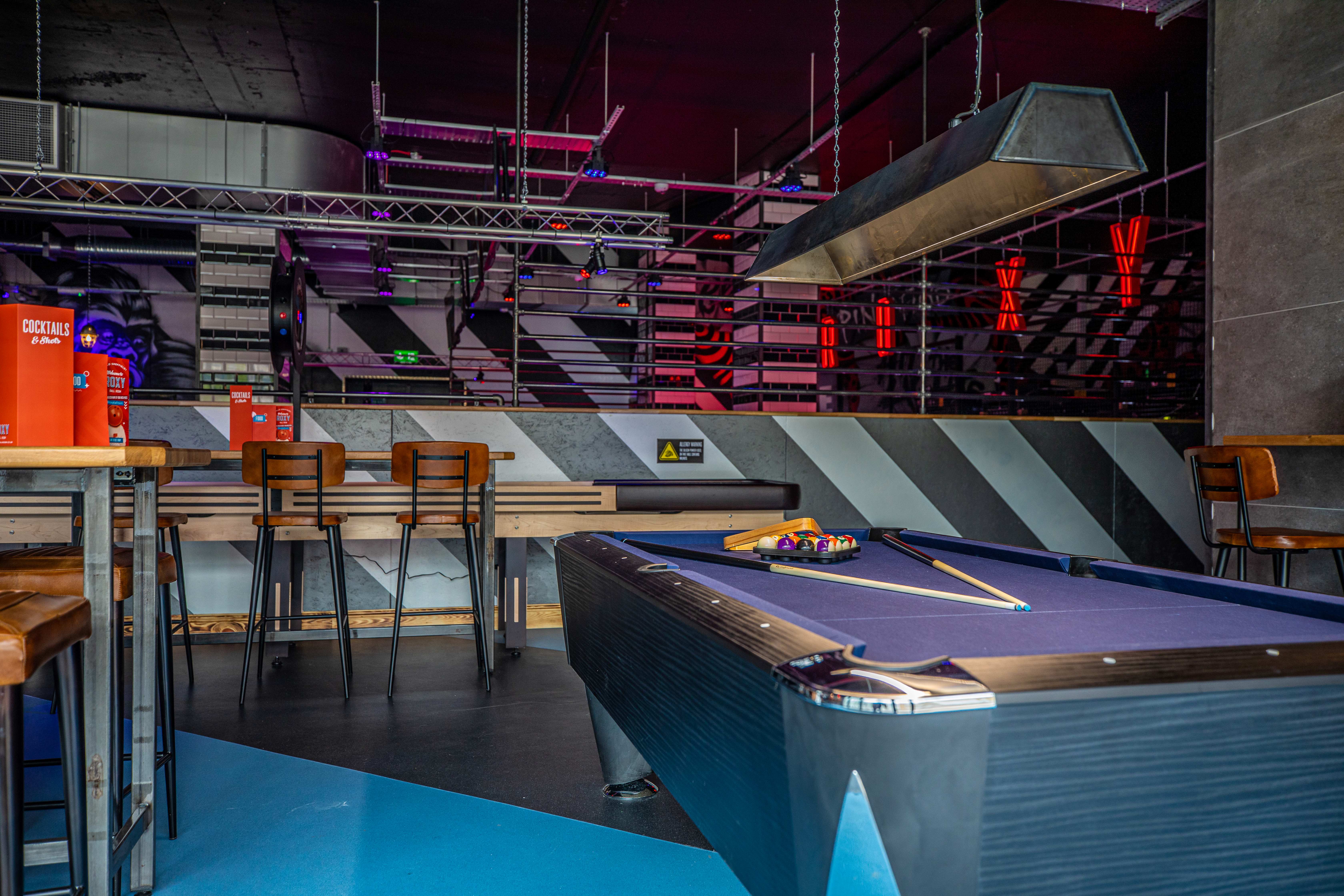 Modern event space at Roxy Ball Room Sheffield, featuring vibrant lighting for social gatherings.