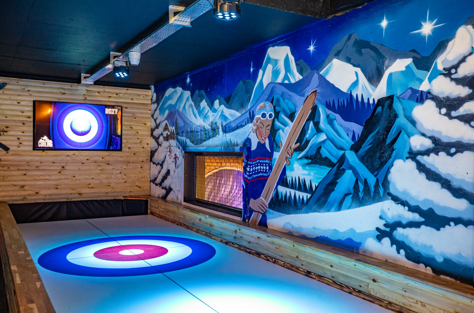 Vibrant curling-themed event space at Roxy Ball Room, Sheffield for team-building activities.
