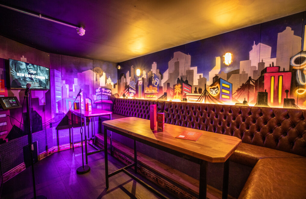 Karaoke room at Roxy Ball Room Sheffield with urban mural for events and gatherings.