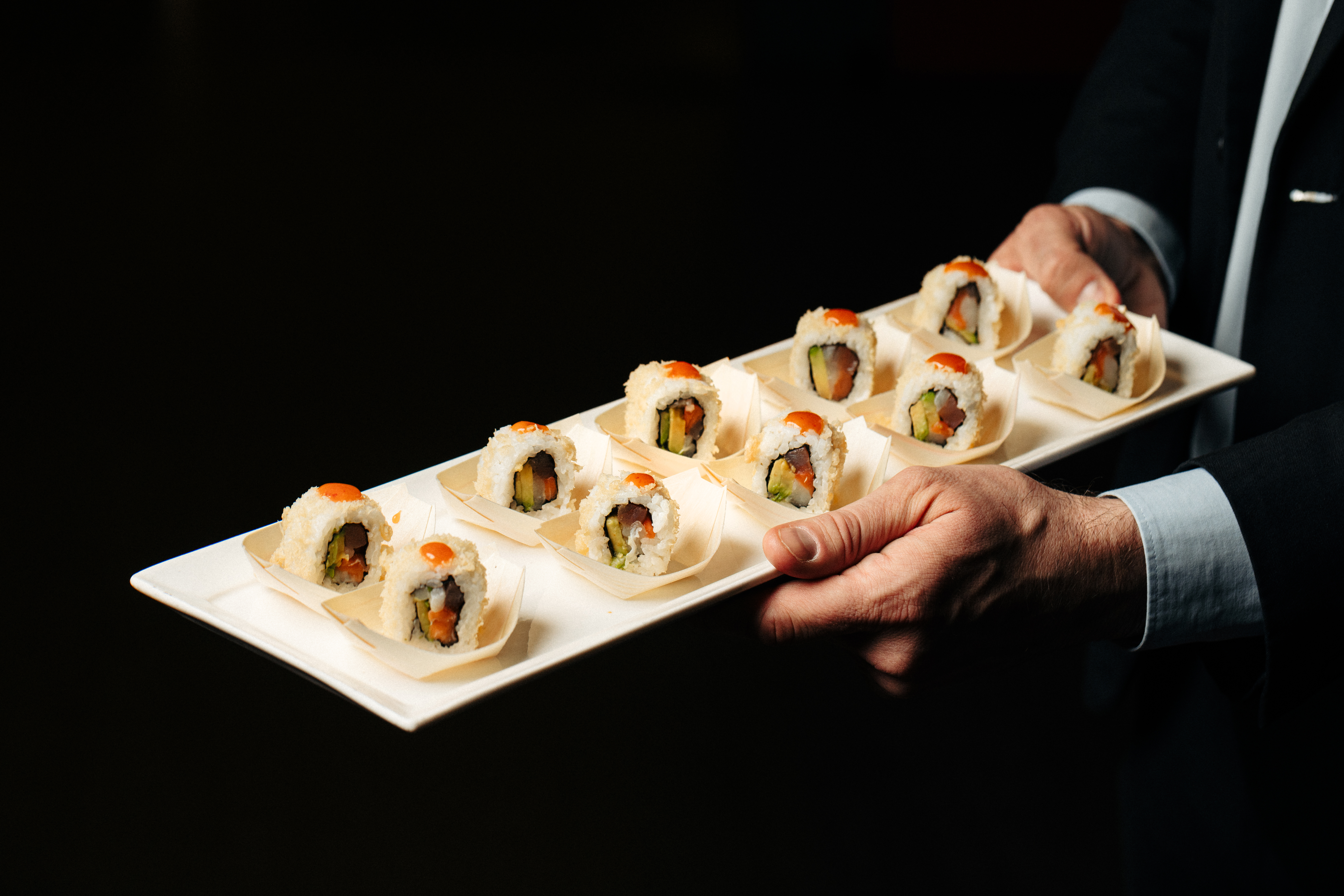 Sushi rolls on a sleek platter for corporate events at Chino Latino, Park Plaza London.