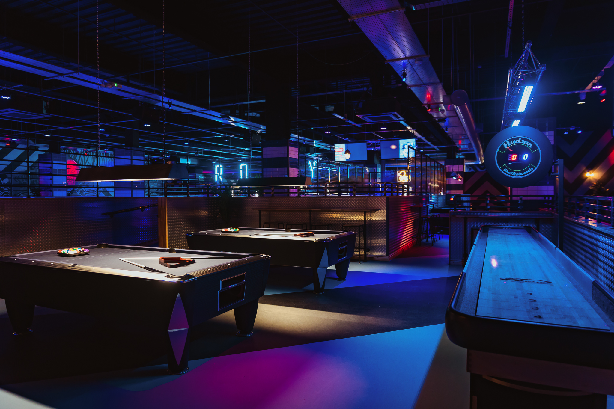 Vibrant event space with billiard tables for social gatherings in Cardiff.