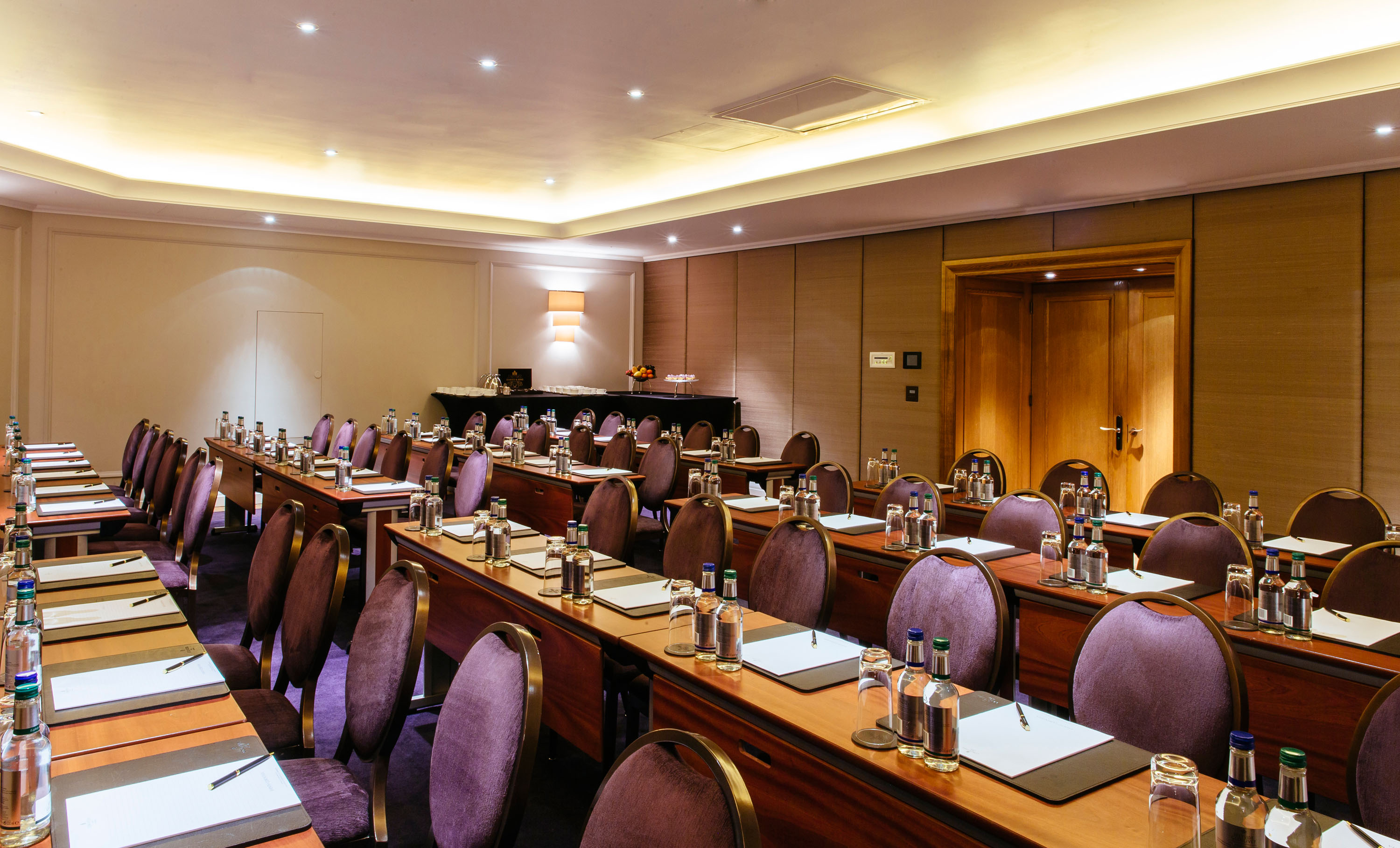 Conference room in The Nelson Room, Corinthia London, set for professional meetings.