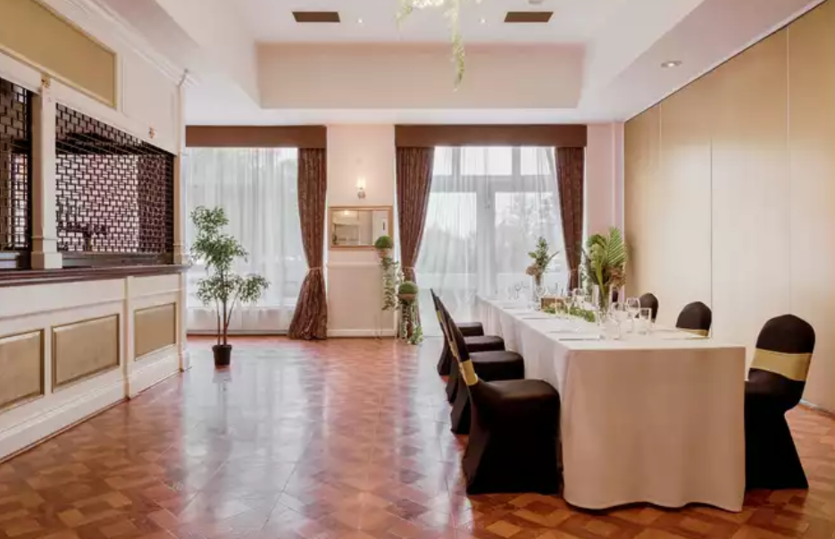 Boardroom meeting setup at Clumber Park Hotel with wood floors for corporate events and conferences.