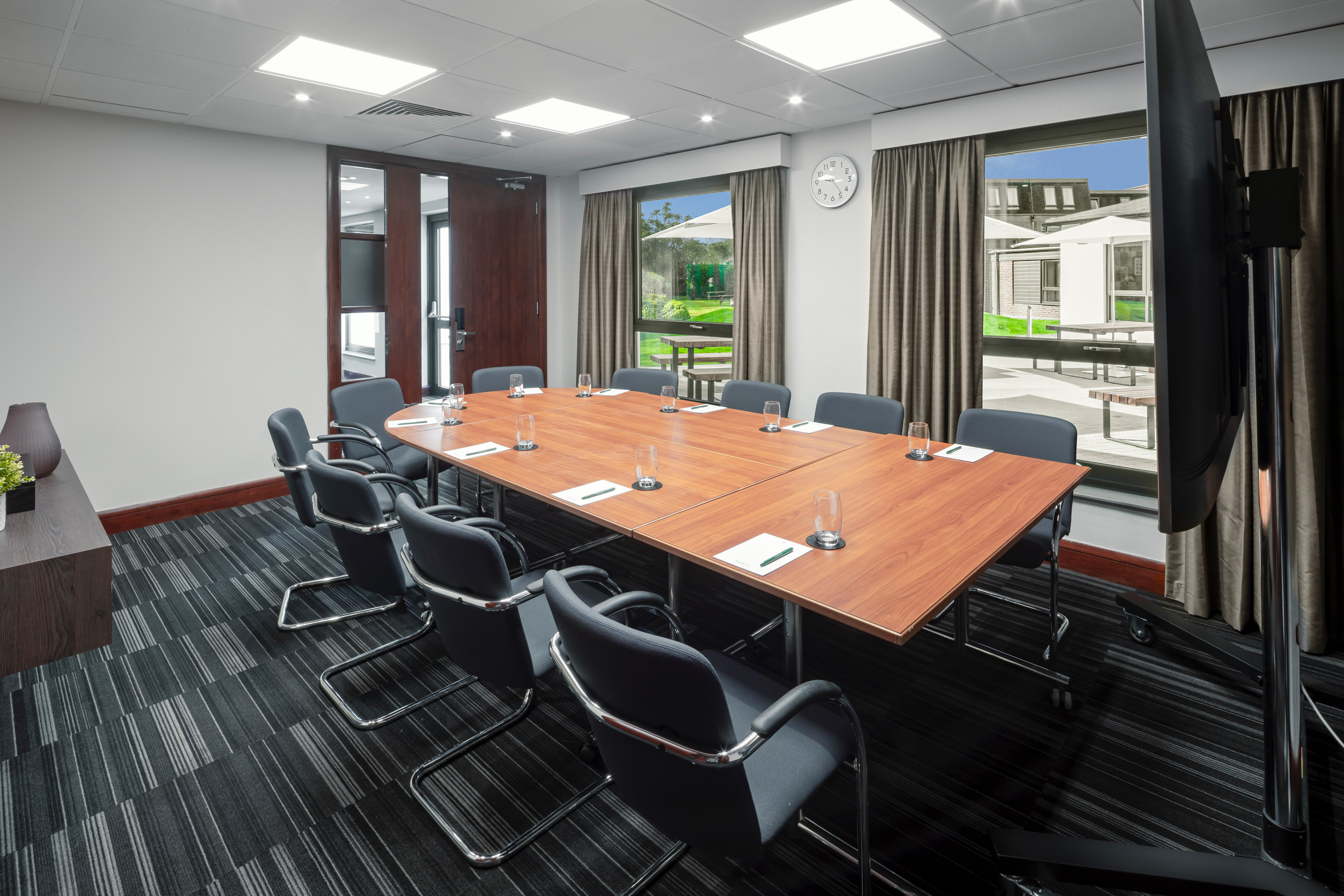 Modern conference room at Holiday Inn London-Bexley, ideal for corporate meetings and events.