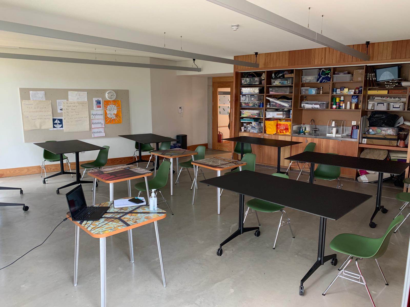 Versatile meeting space with flexible seating in Grand Junction for workshops and brainstorming.