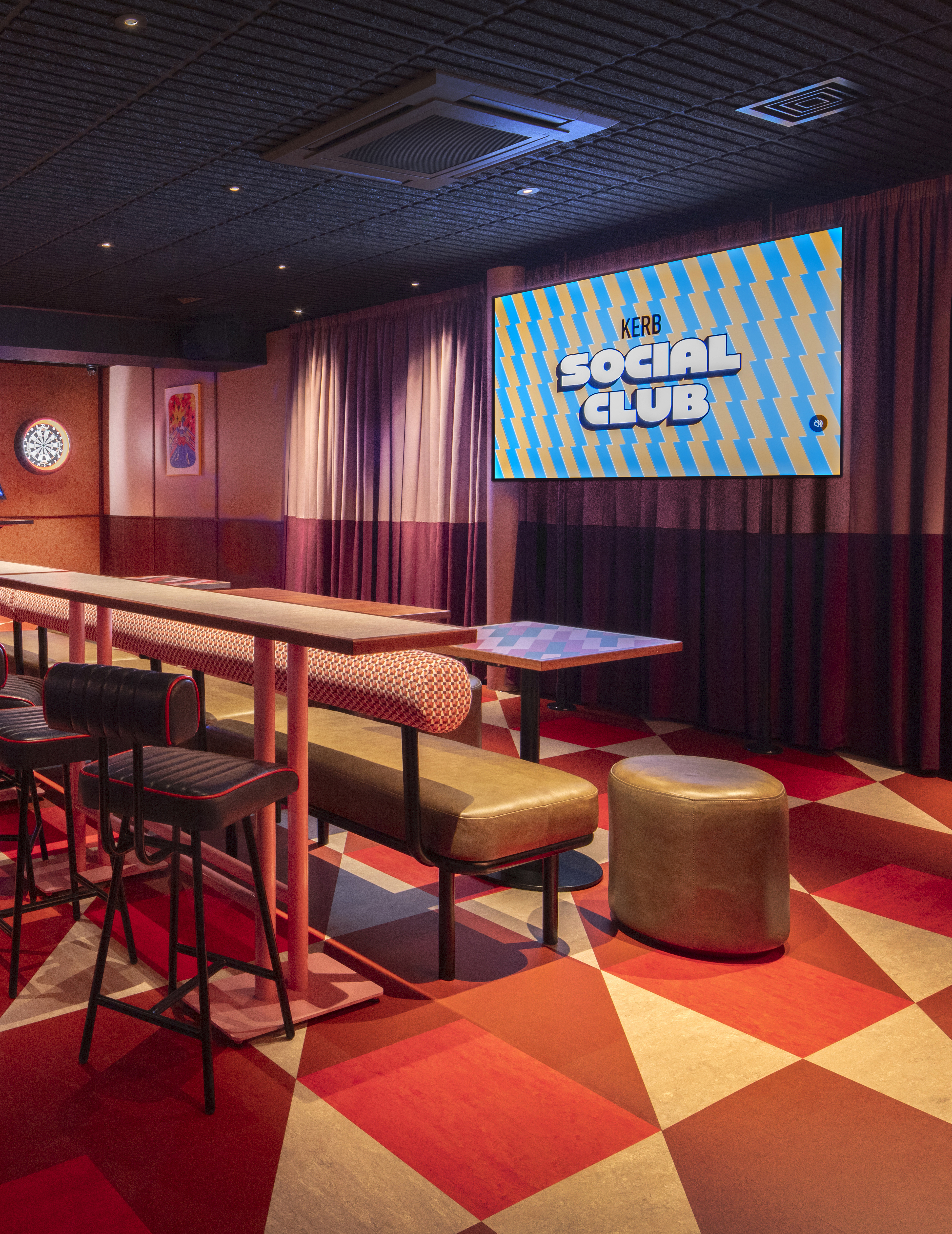 Alt text: Vibrant Pitstop Room at KERB Social Club, perfect for team-building events.