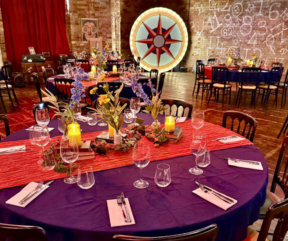 Elegant event venue setup with floral centerpieces for a magical celebration.