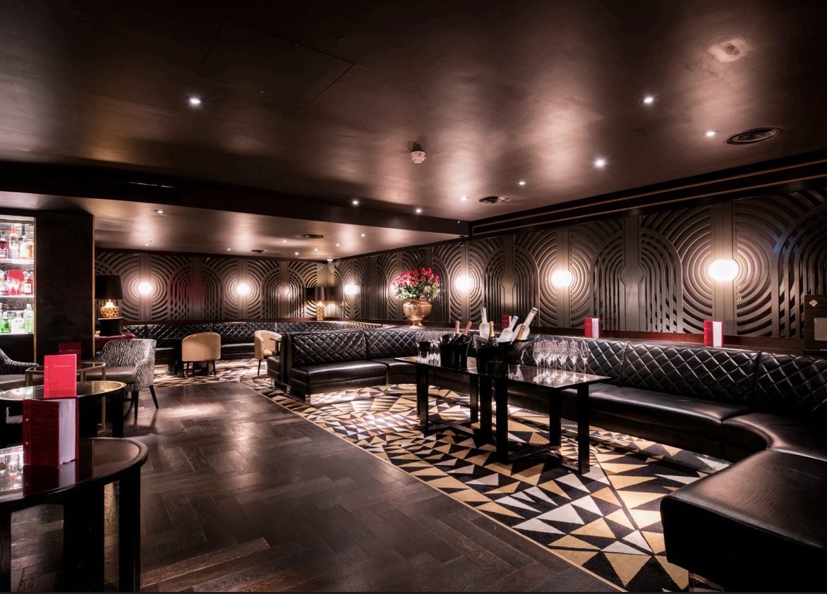 Mezzanine Bar at Quaglino's: upscale event venue with stylish seating and ambient lighting.